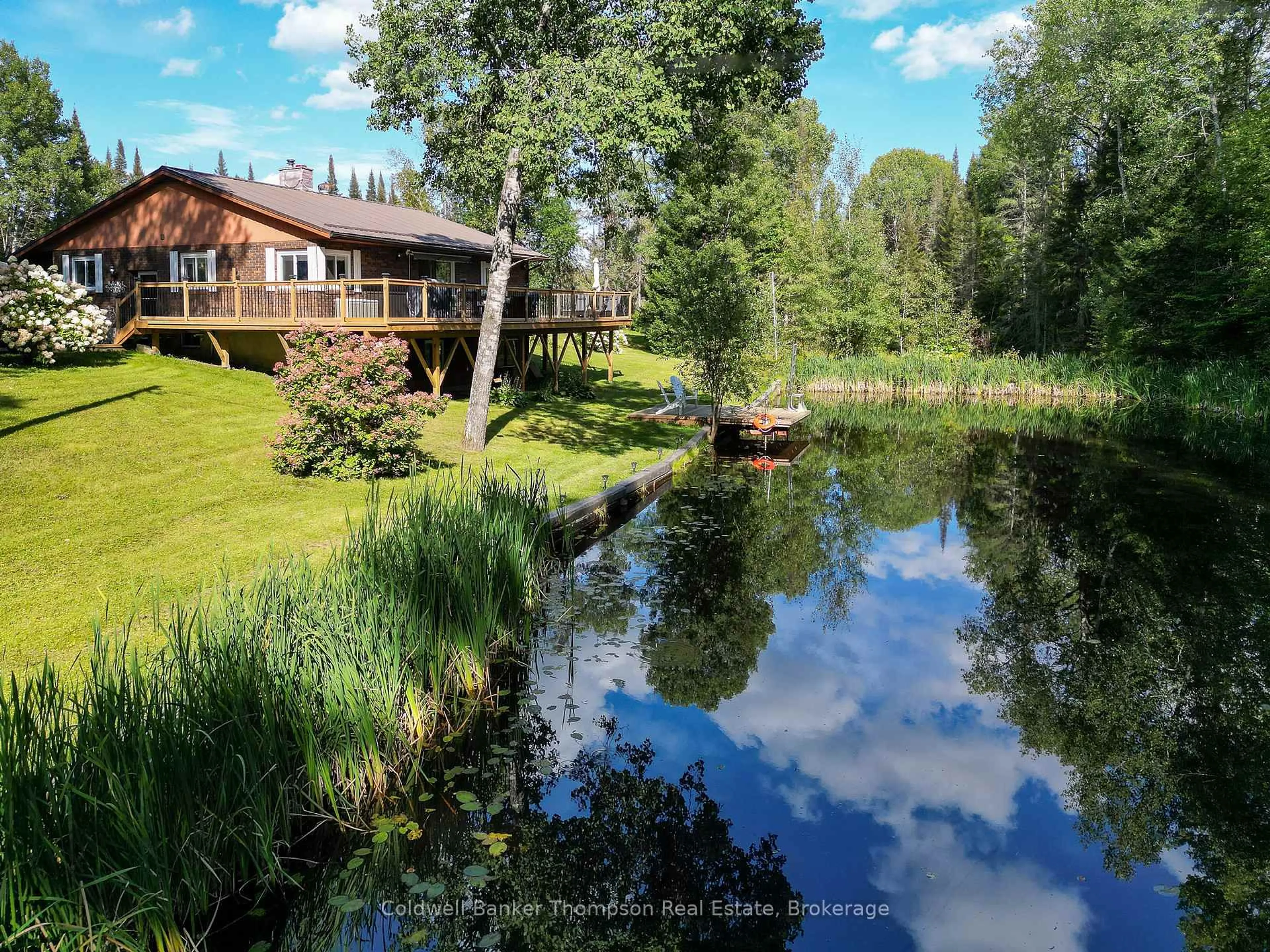 A pic from outside/outdoor area/front of a property/back of a property/a pic from drone, water/lake/river/ocean view for 15 Municipal Rd, Machar Ontario P0A 1X0