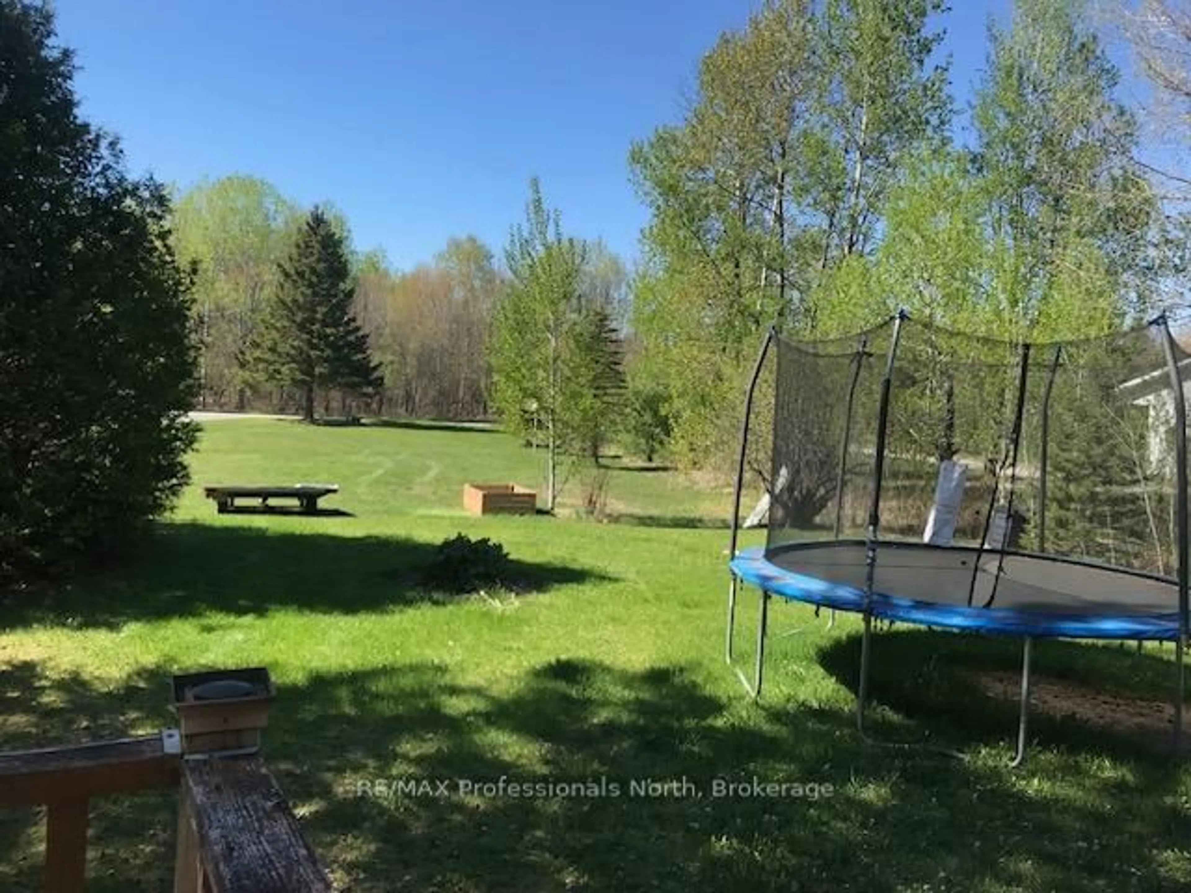 A pic from outside/outdoor area/front of a property/back of a property/a pic from drone, forest/trees view for 1093 Tiffany Lane, Minden Hills Ontario K0M 2K0