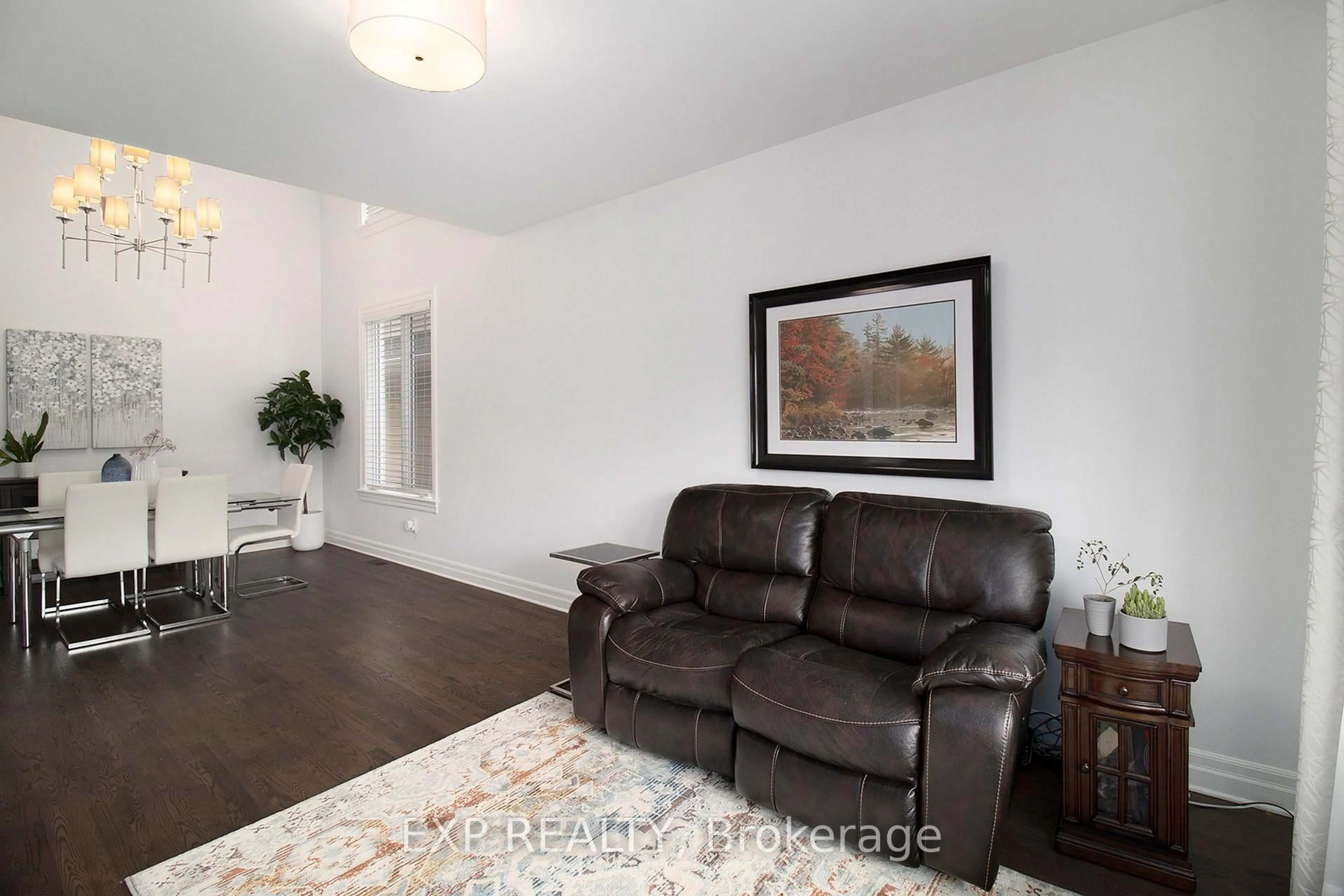 Living room with furniture, wood/laminate floor for 179 Avro Circ, Ottawa Ontario K1K 4Y9