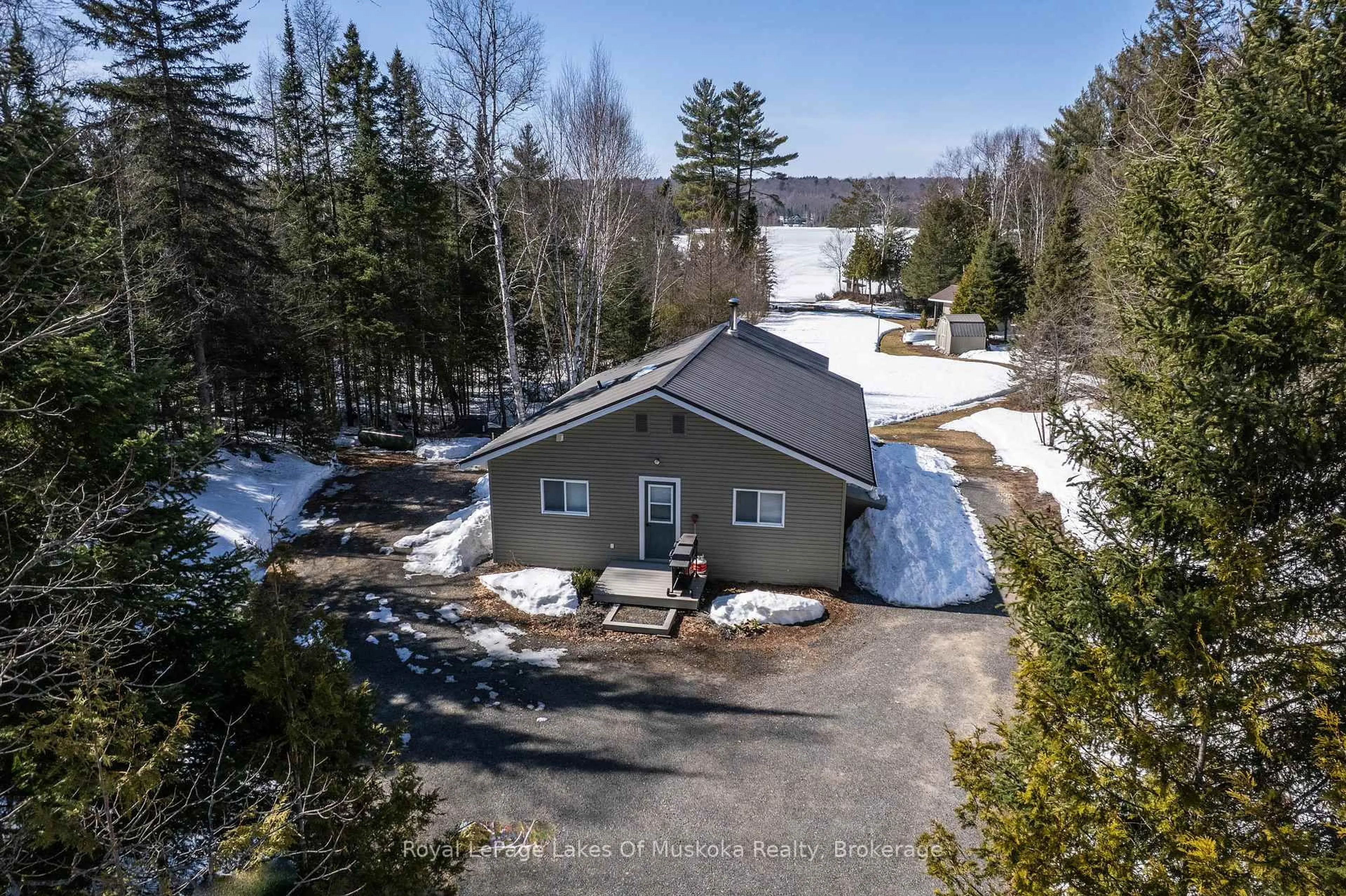 A pic from outside/outdoor area/front of a property/back of a property/a pic from drone, unknown for 612 Clam Lake Rd, Kearney Ontario P0A 1M0