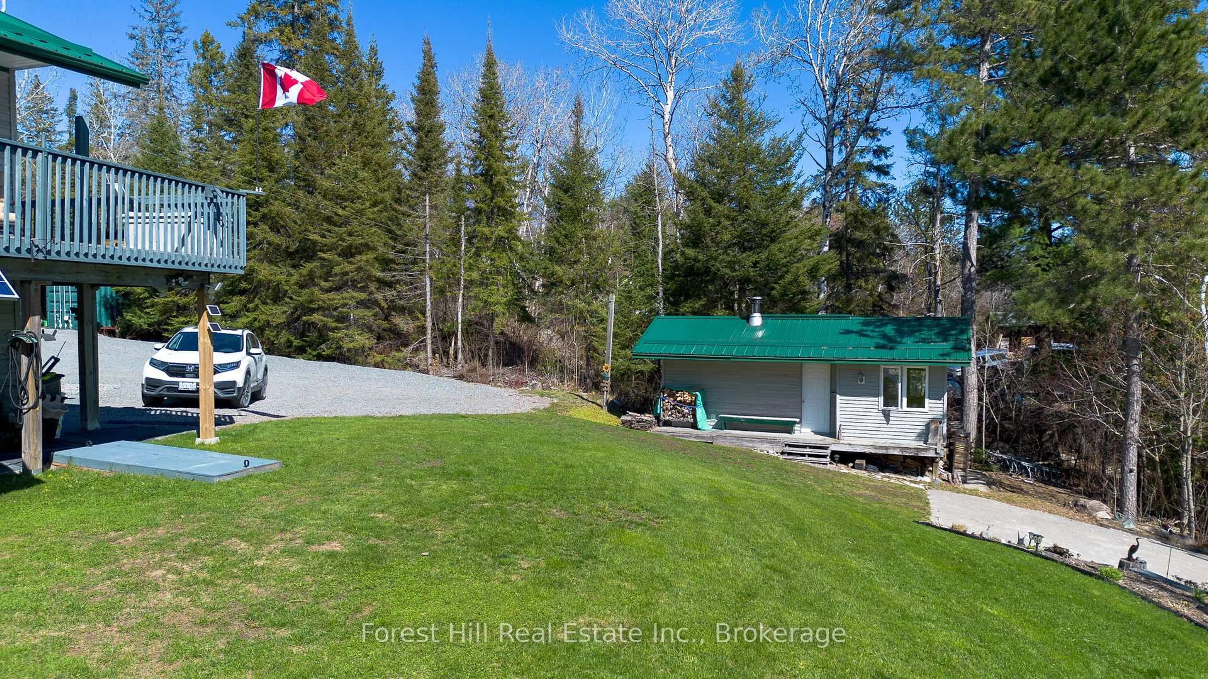 A pic from outside/outdoor area/front of a property/back of a property/a pic from drone, forest/trees view for 1933 Bushy Bay Rd, Greater Sudbury Ontario P0M 3C0