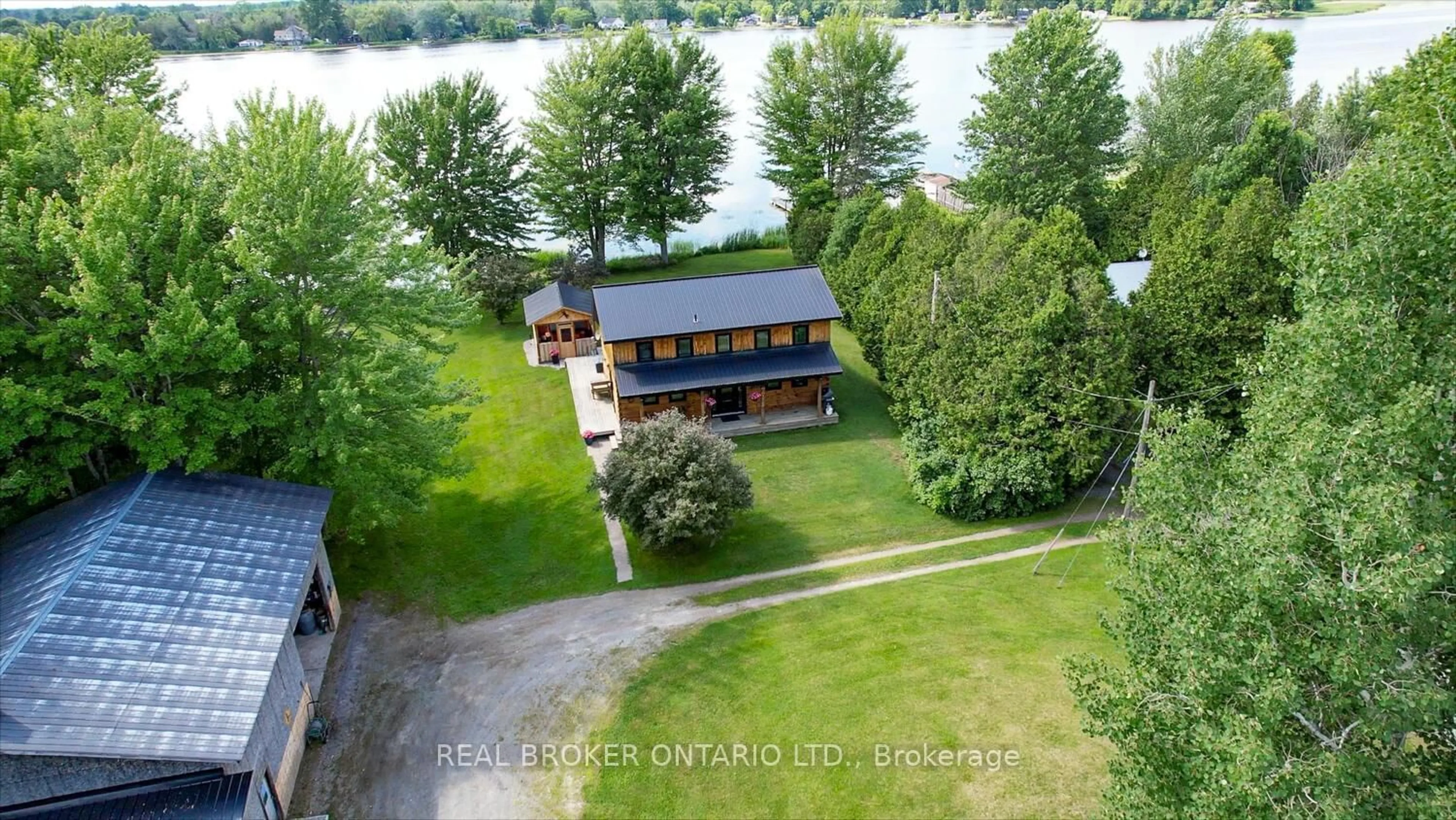 A pic from outside/outdoor area/front of a property/back of a property/a pic from drone, water/lake/river/ocean view for 60 Corktown Lane, Merrickville-Wolford Ontario K0G 1N0