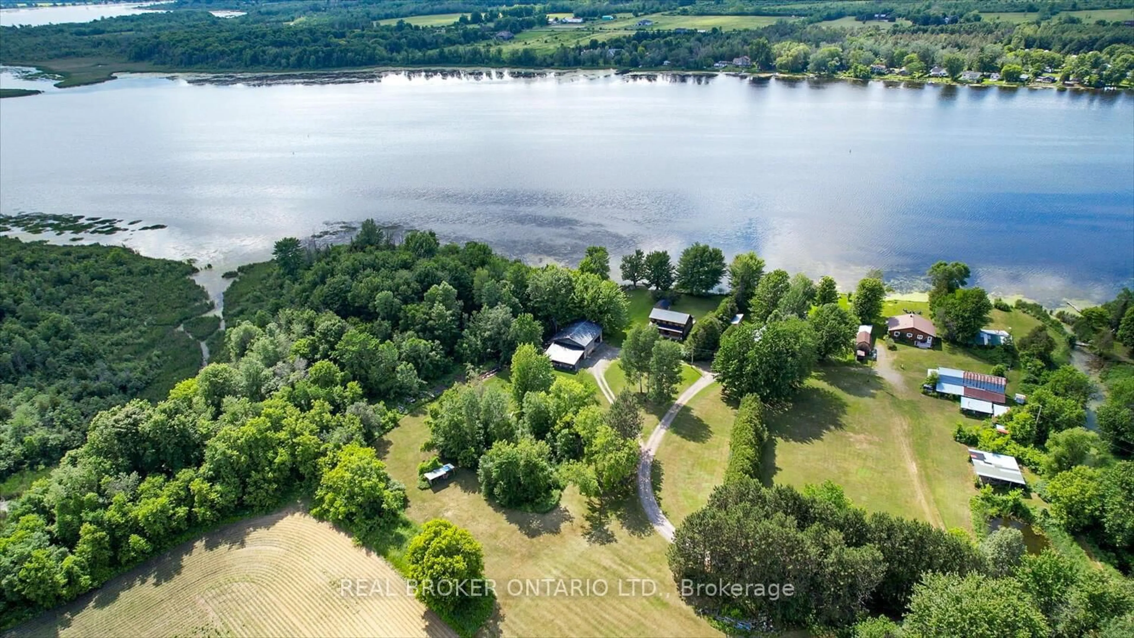 A pic from outside/outdoor area/front of a property/back of a property/a pic from drone, water/lake/river/ocean view for 60 Corktown Lane, Merrickville-Wolford Ontario K0G 1N0