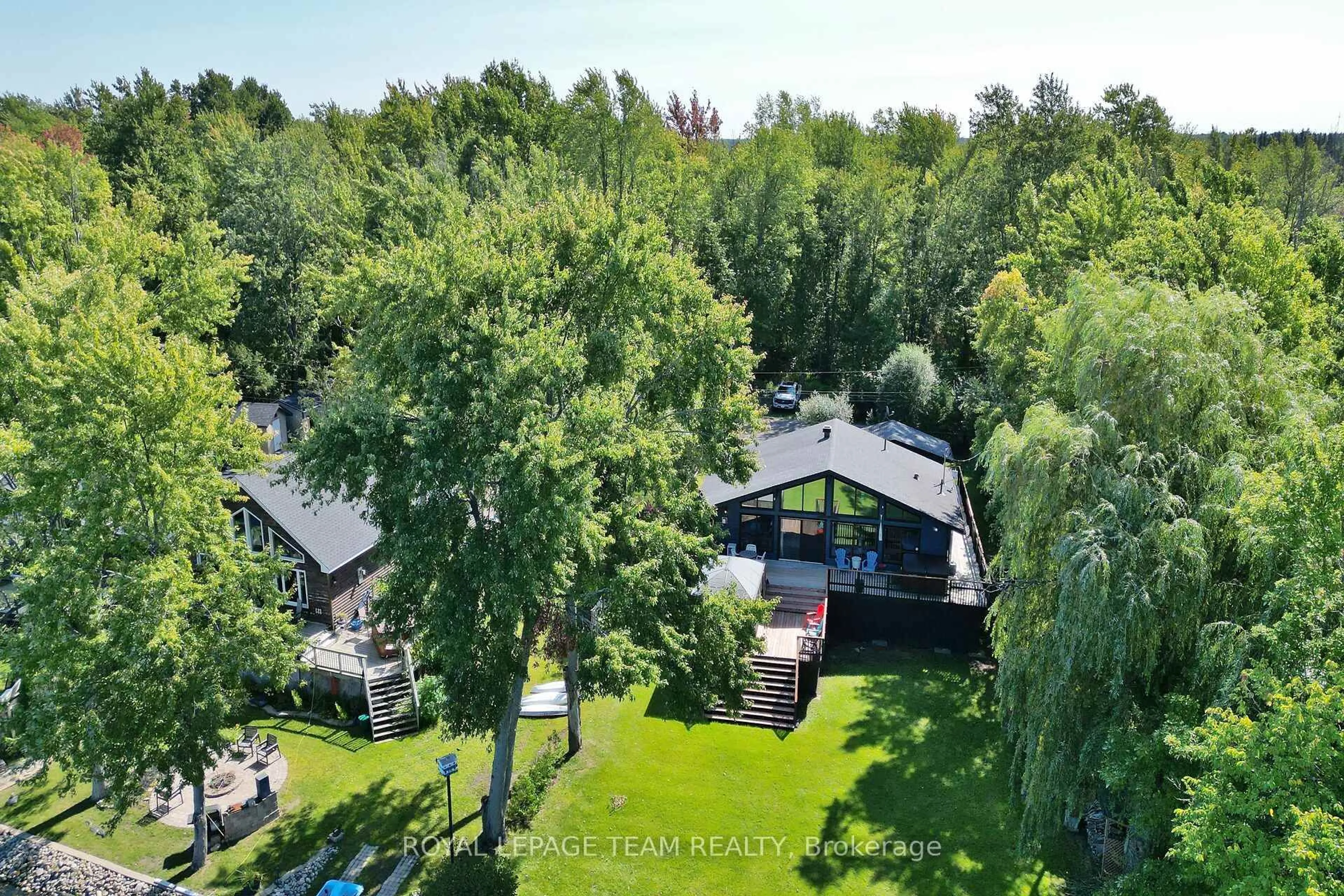 A pic from outside/outdoor area/front of a property/back of a property/a pic from drone, forest/trees view for 1303 HILLY Lane, North Grenville Ontario K0G 1J0