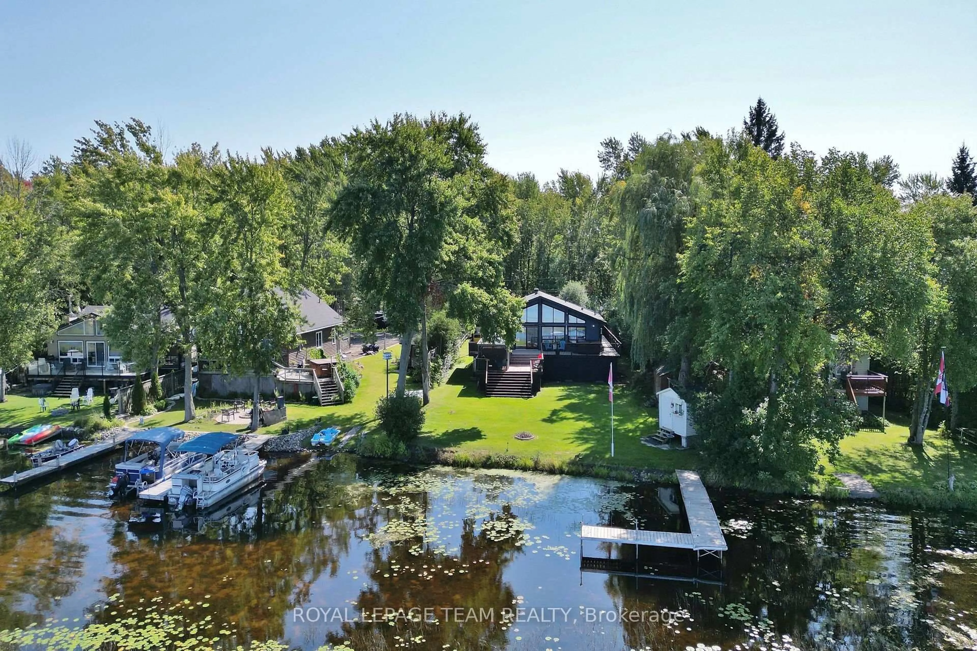 A pic from outside/outdoor area/front of a property/back of a property/a pic from drone, water/lake/river/ocean view for 1303 HILLY Lane, North Grenville Ontario K0G 1J0