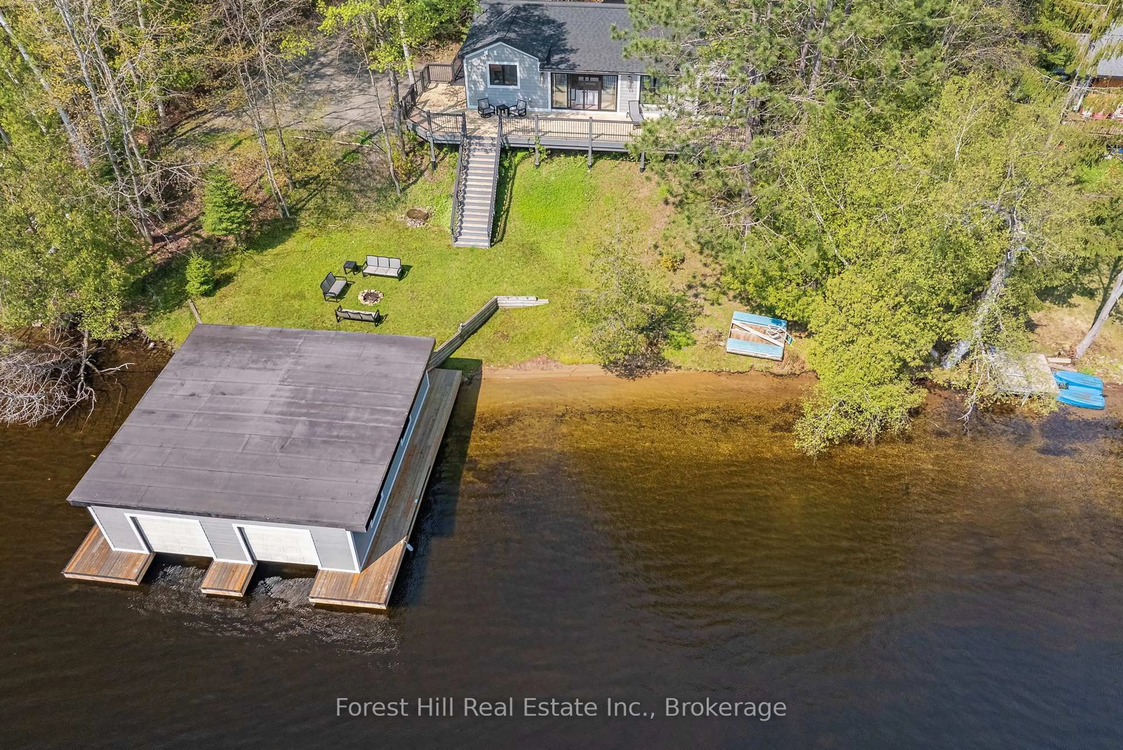 A pic from outside/outdoor area/front of a property/back of a property/a pic from drone, water/lake/river/ocean view for 1017 WHITE PINE Rd, Lake of Bays Ontario P1H 2J3