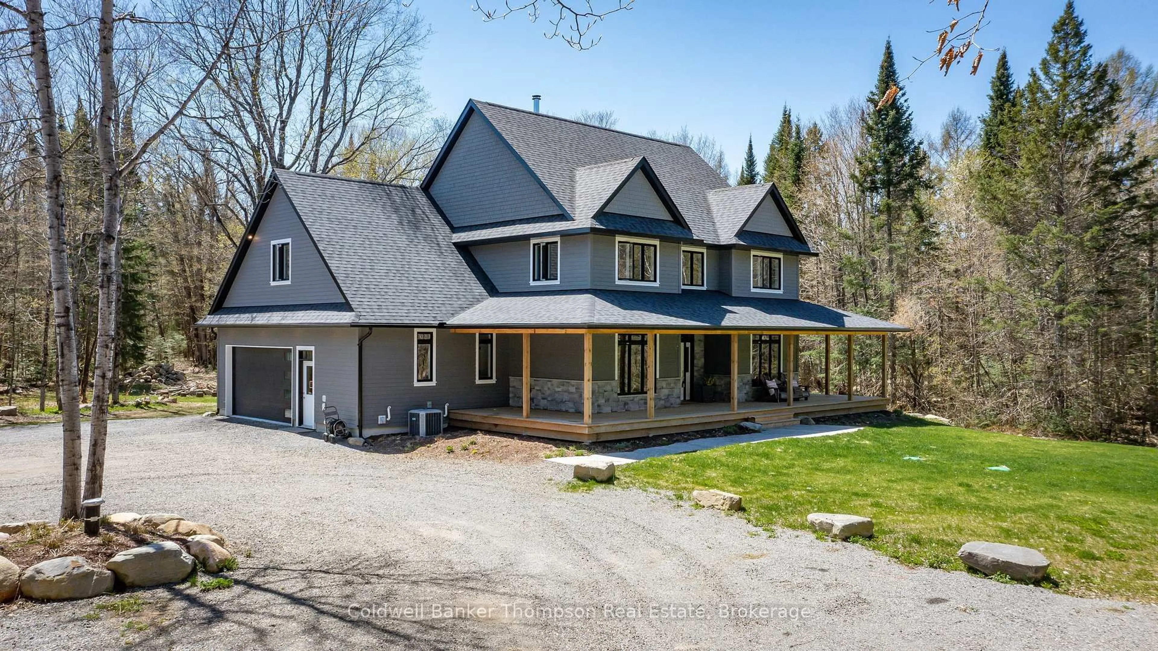 A pic from outside/outdoor area/front of a property/back of a property/a pic from drone, street for 1292 Millar Hill Rd, Lake of Bays Ontario P1H 2J6