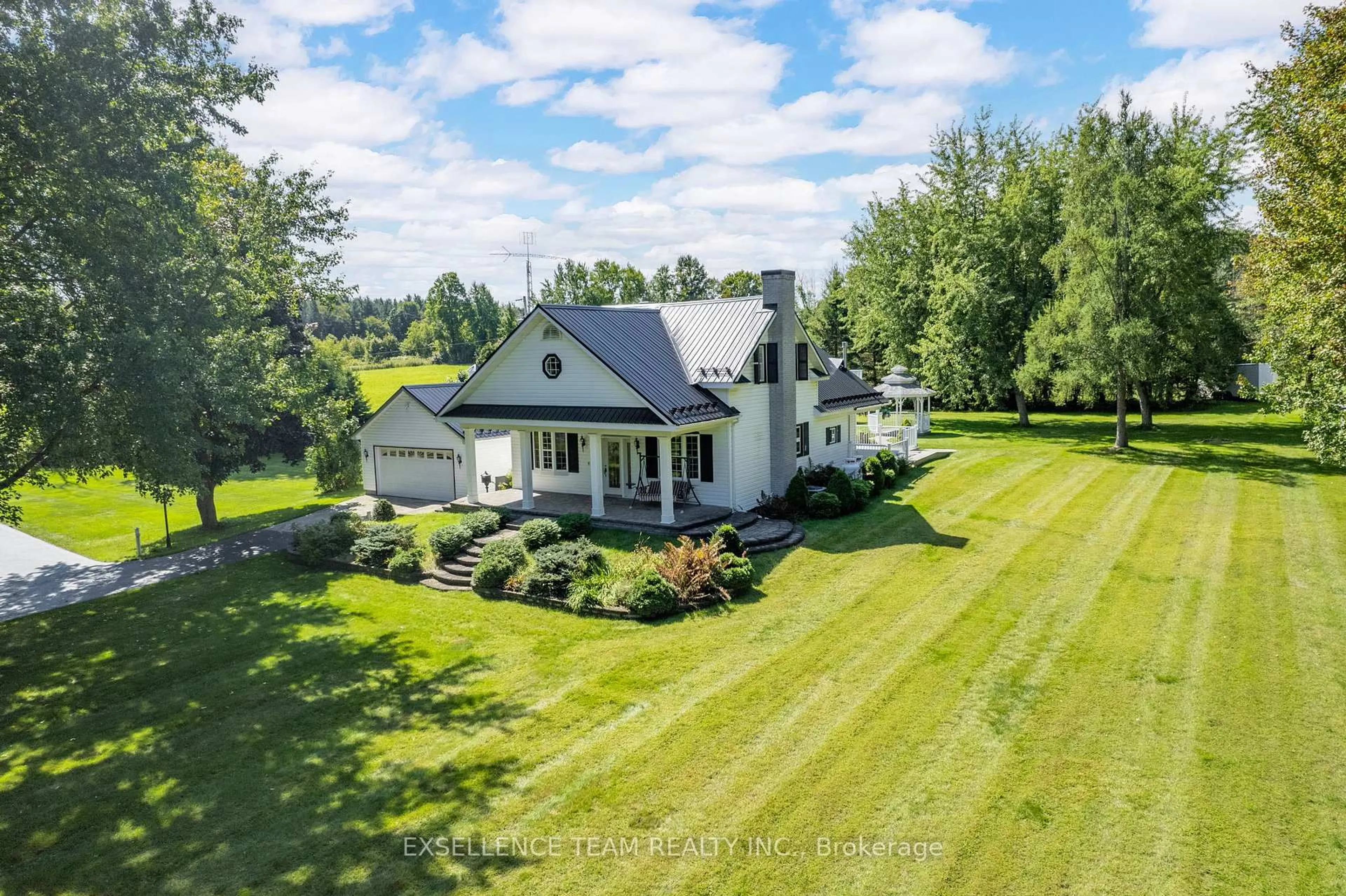 A pic from outside/outdoor area/front of a property/back of a property/a pic from drone, water/lake/river/ocean view for 2940 County Rd 20 Rd, North Glengarry Ontario K0C 1T0