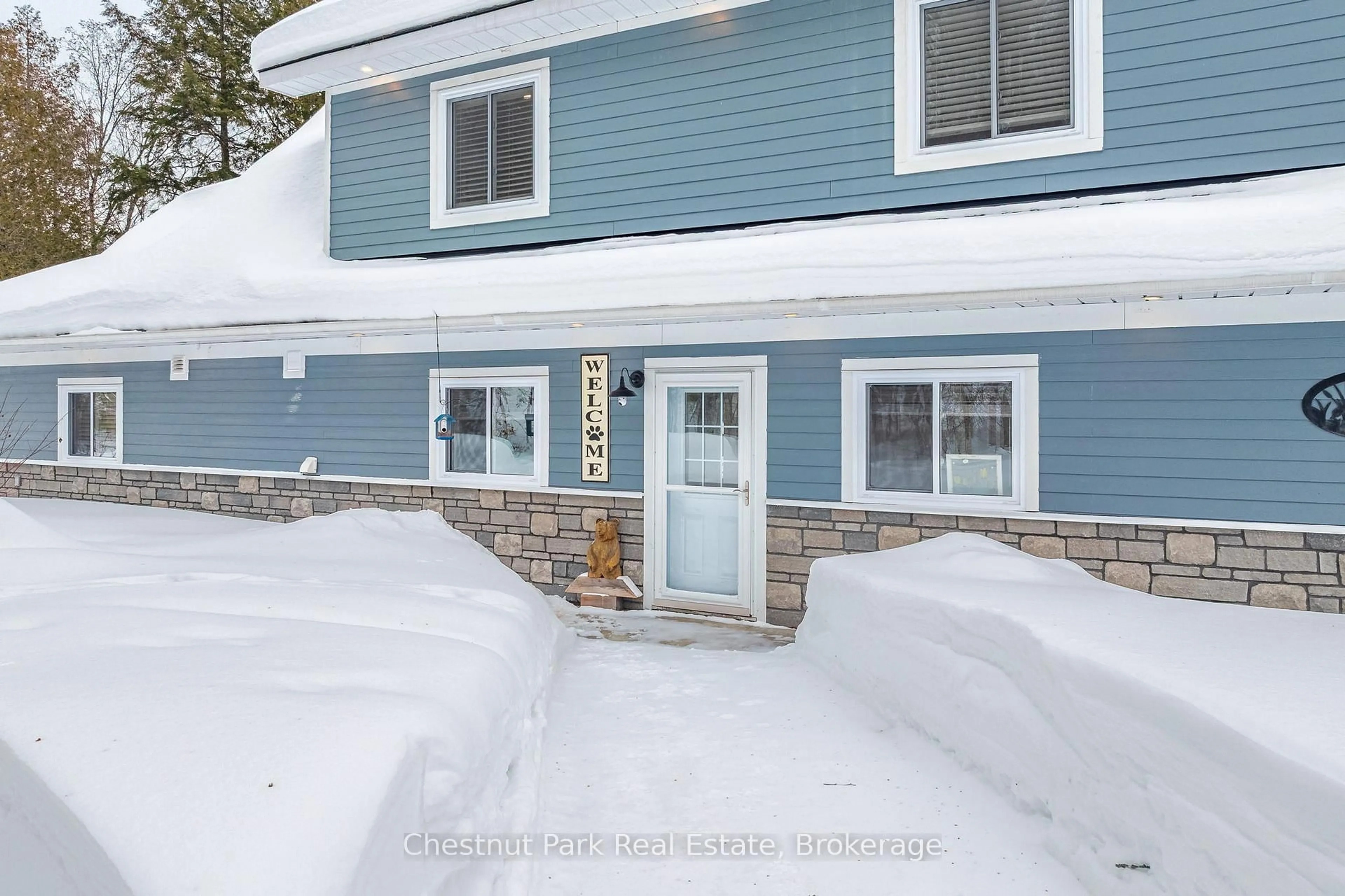 A pic from outside/outdoor area/front of a property/back of a property/a pic from drone, street for 1030 Brooks Lake Rd, Lake of Bays Ontario P1H 2J6