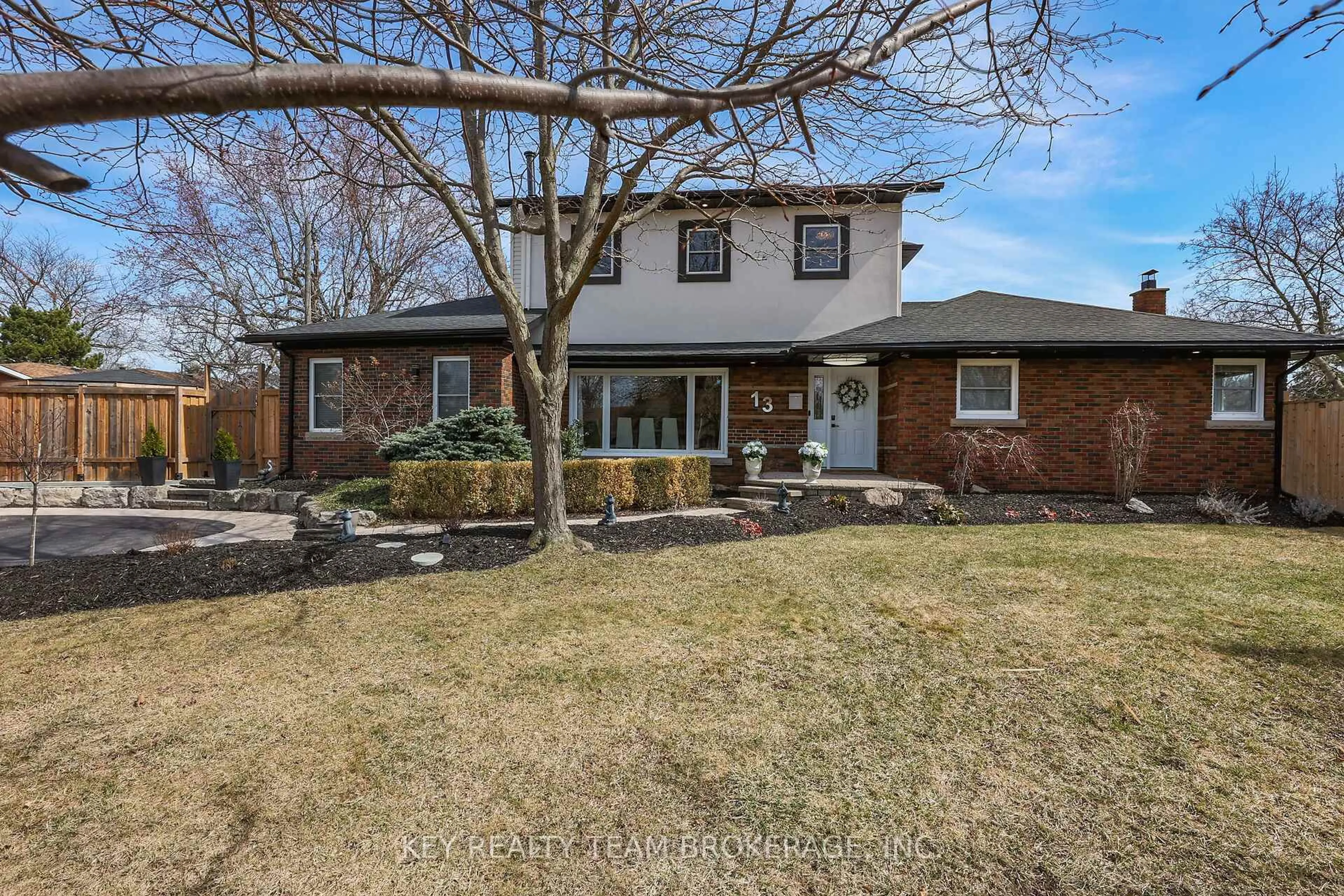 Home with brick exterior material, street for 13 Marsdale Dr, St. Catharines Ontario L2T 3S1