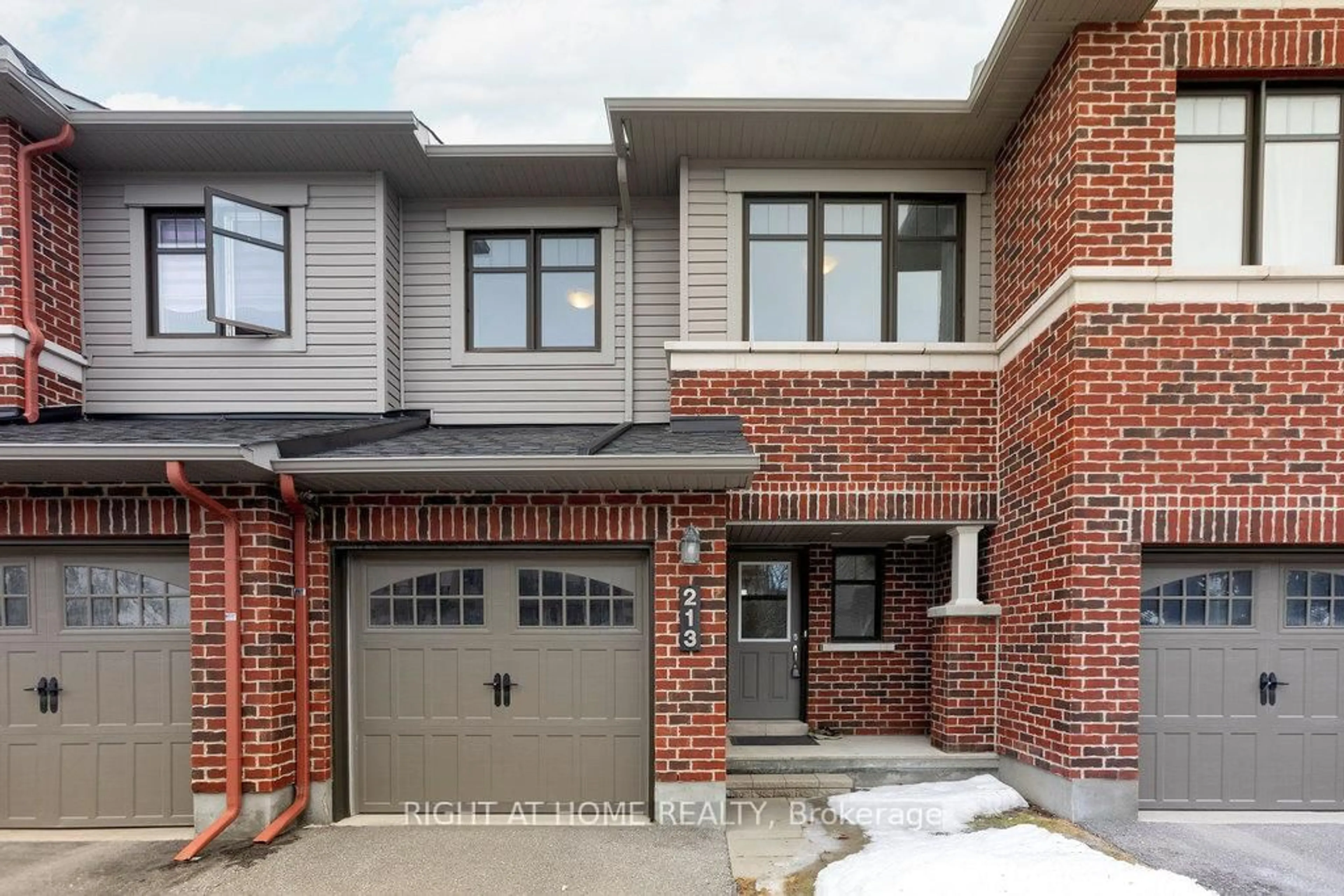 Home with brick exterior material, street for 213 HALYARD Way, Ottawa Ontario K2T 0L2