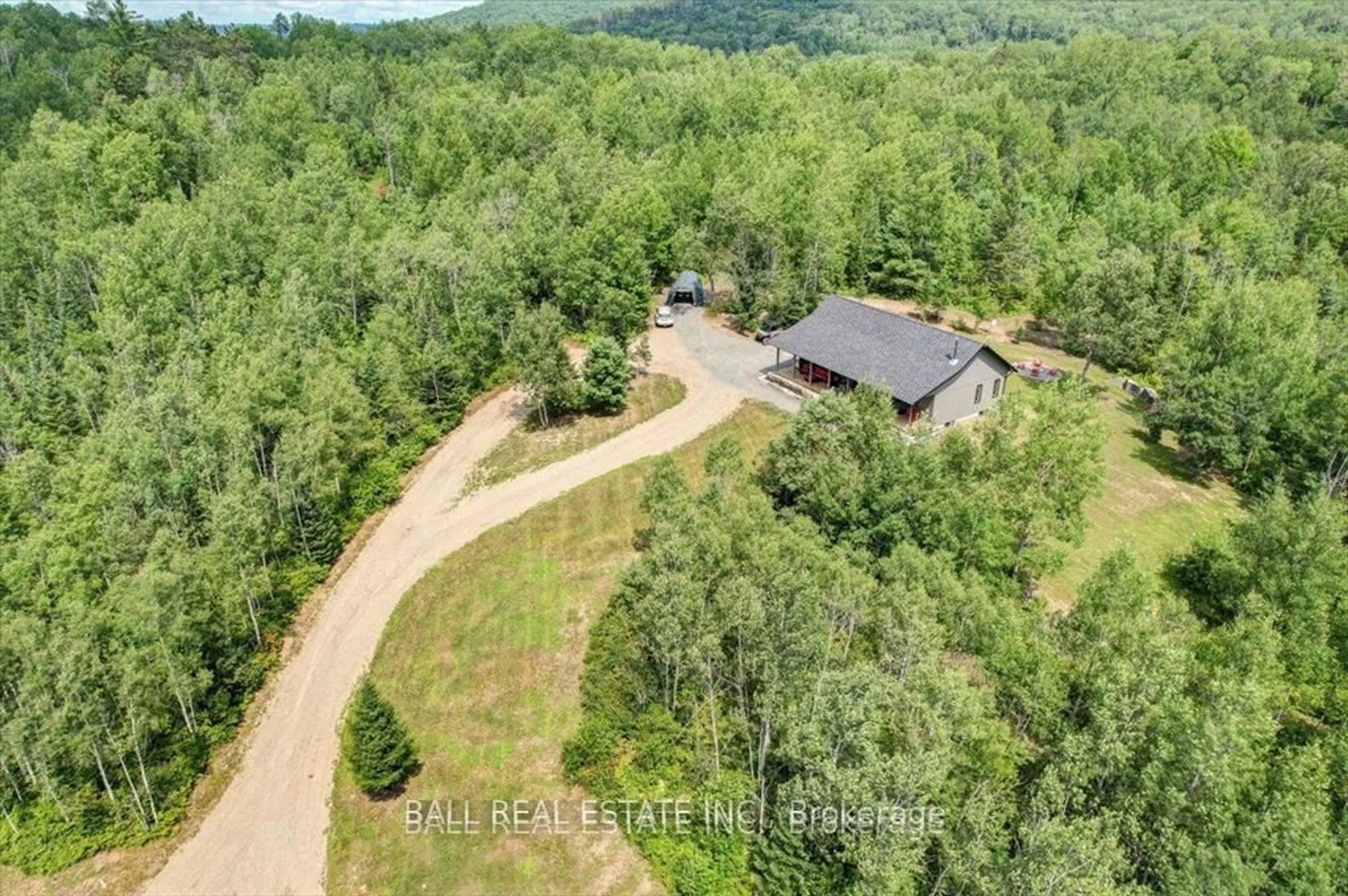 A pic from outside/outdoor area/front of a property/back of a property/a pic from drone, forest/trees view for 81 All Star Resort Lane, Madawaska Ontario K0J 2C0