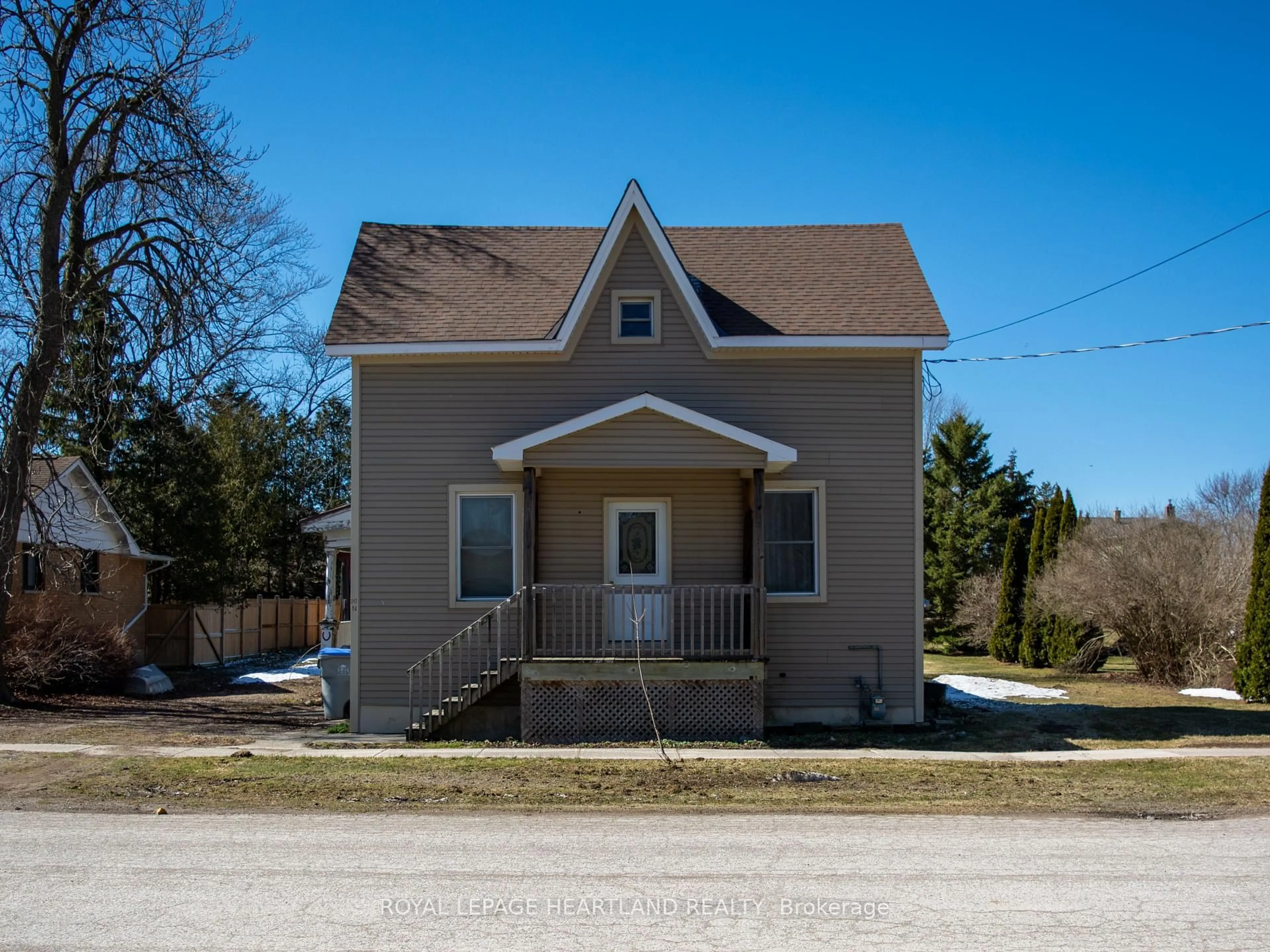 Home with vinyl exterior material, street for 20 King St, South Huron Ontario N0M 1M0