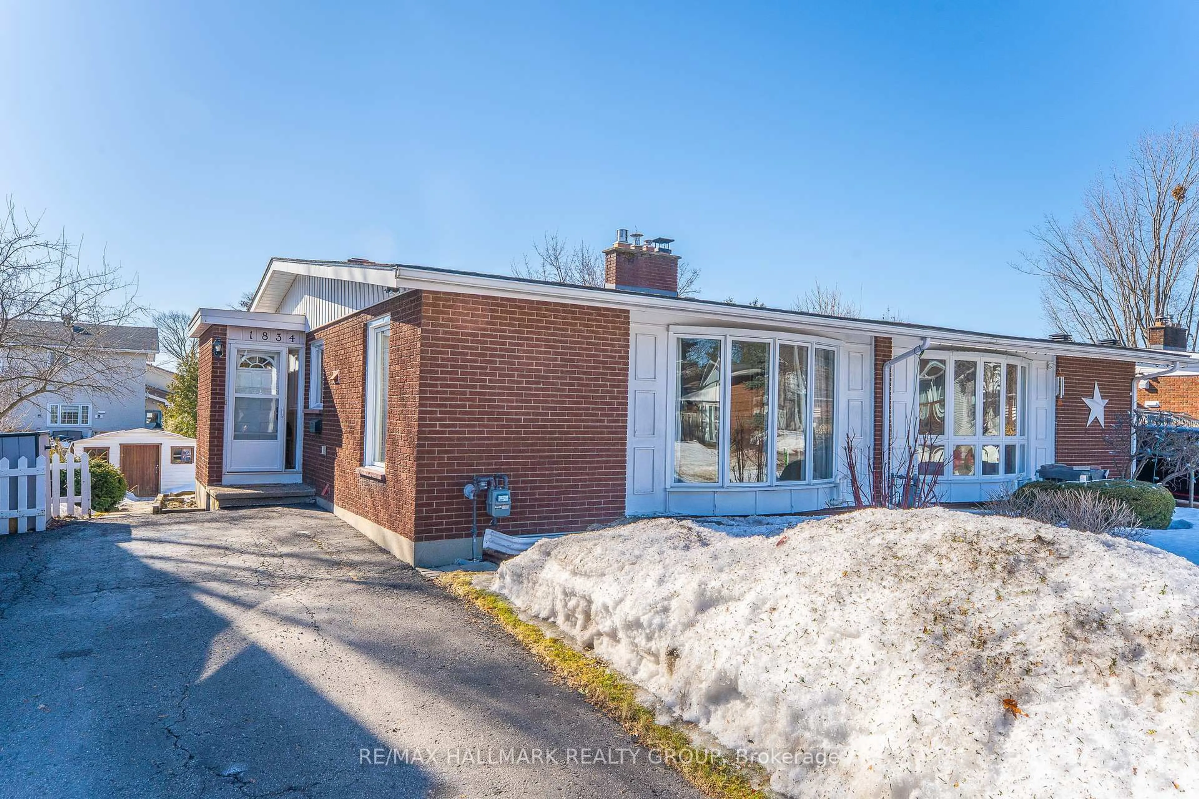 Home with brick exterior material, street for 1834 Cloverlawn Cres, Ottawa Ontario K1J 6V2