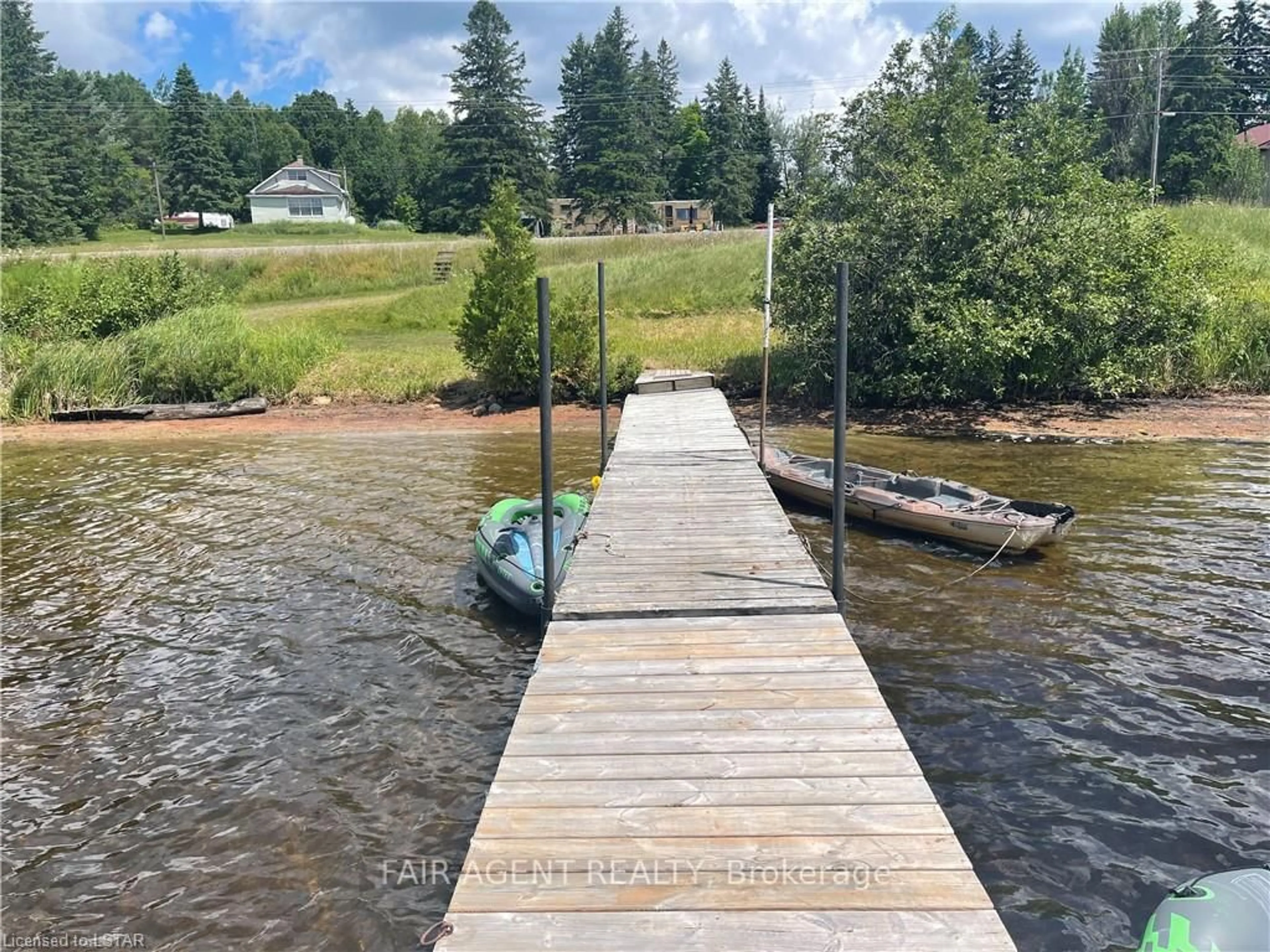 A pic from outside/outdoor area/front of a property/back of a property/a pic from drone, water/lake/river/ocean view for 2442 HIGHWAY 520 N/A, Magnetawan Ontario P0A 1C0