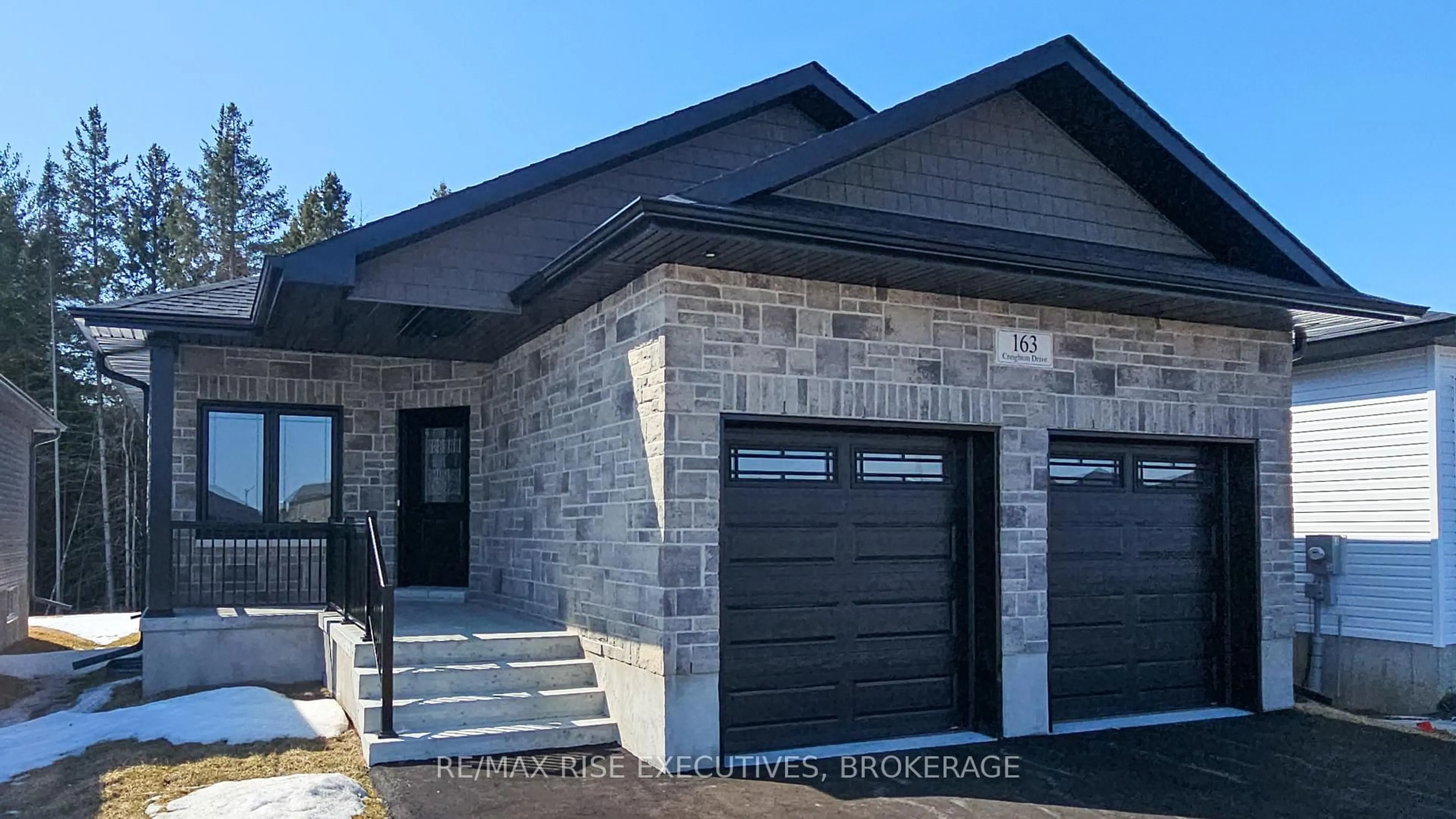 Home with brick exterior material, street for 163 Creighton Dr, Bissett Creek Ontario K0H 2H0