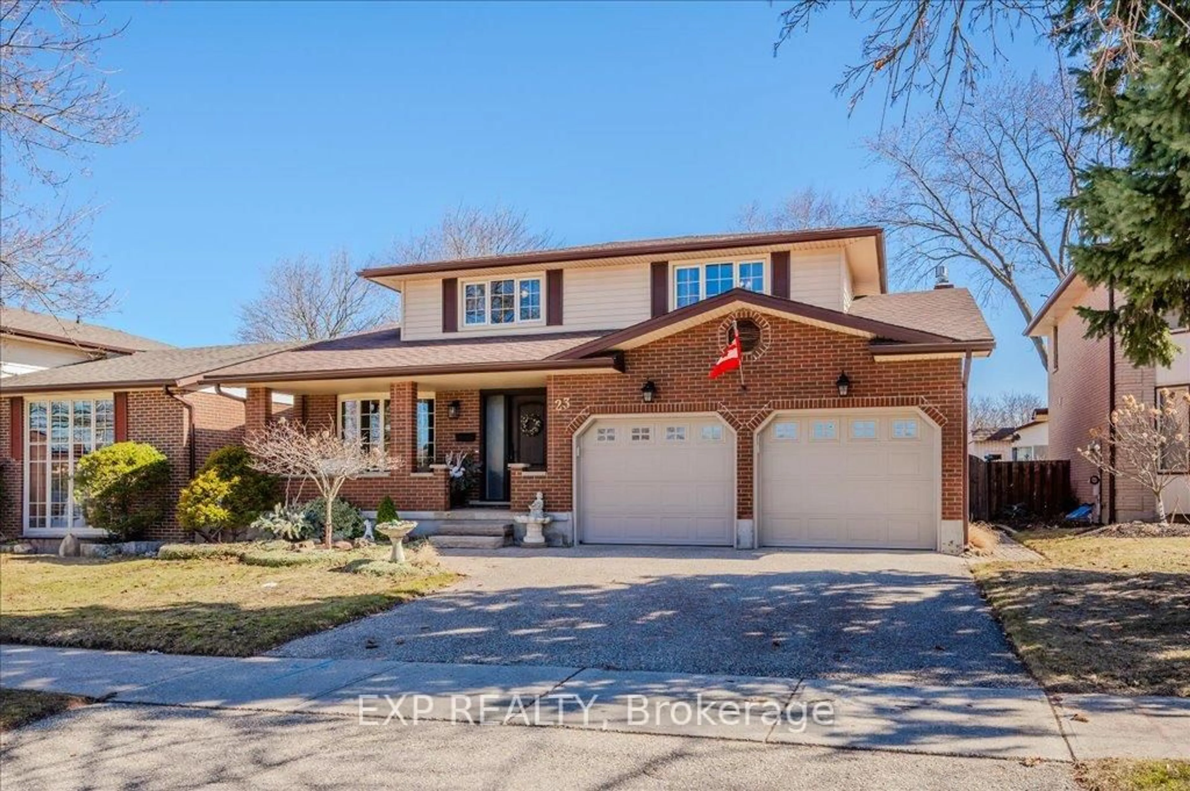 Home with brick exterior material, street for 23 Countryside Cres, Kitchener Ontario N2E 2S8