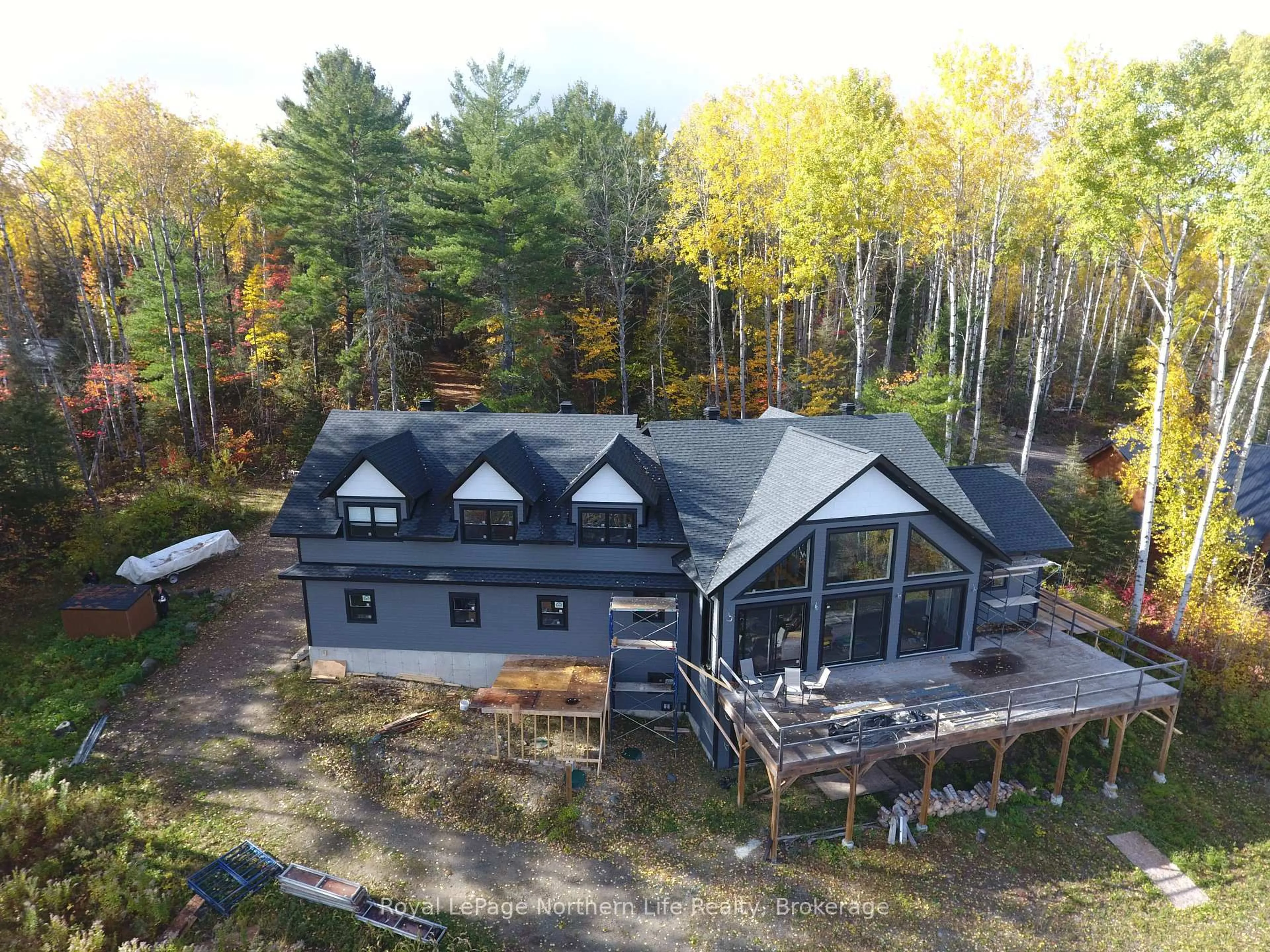 A pic from outside/outdoor area/front of a property/back of a property/a pic from drone, unknown for 429 FOX RUN Dr, Temagami Ontario P0H 2H0