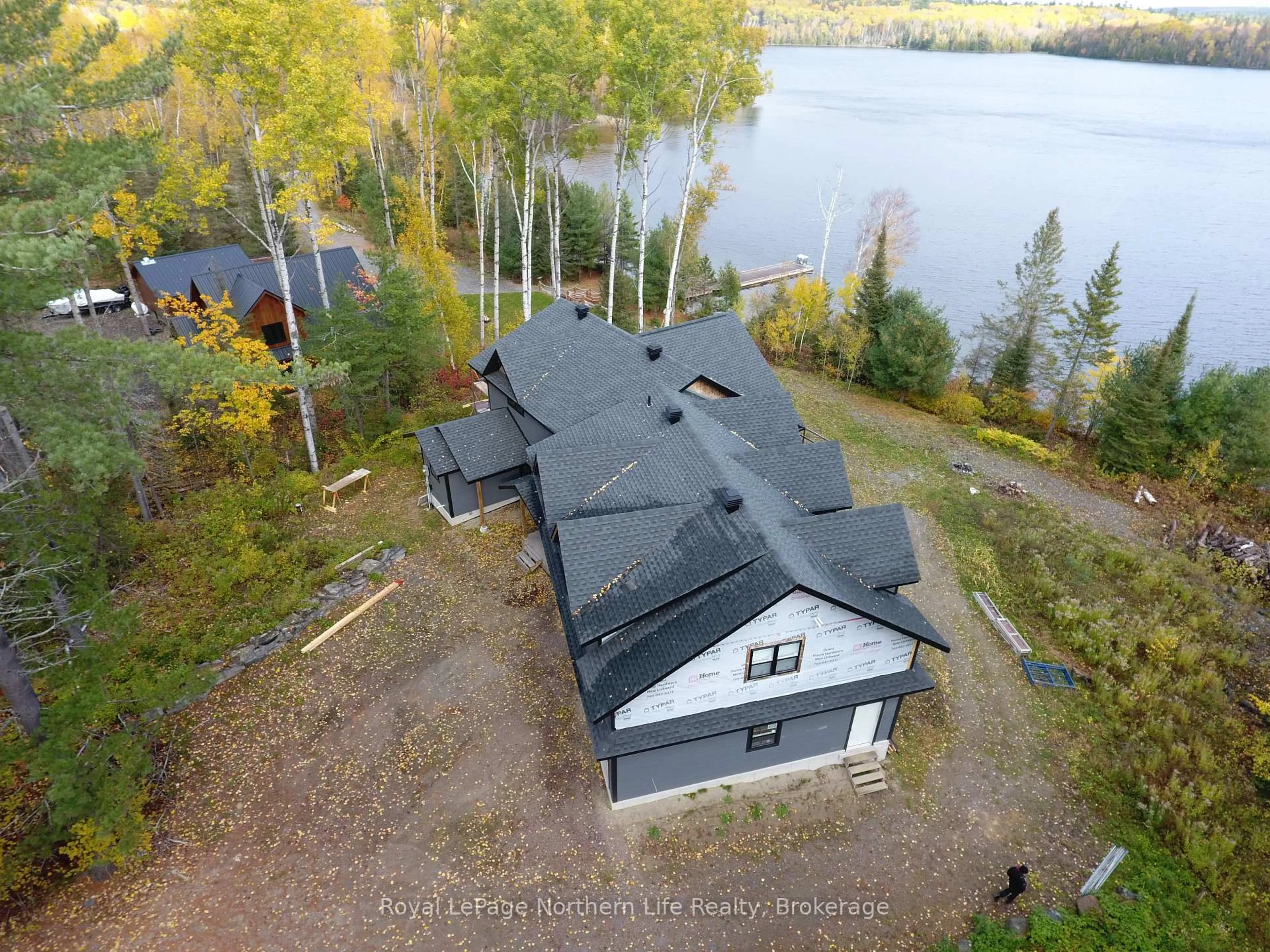 A pic from outside/outdoor area/front of a property/back of a property/a pic from drone, water/lake/river/ocean view for 429 FOX RUN Dr, Temagami Ontario P0H 2H0