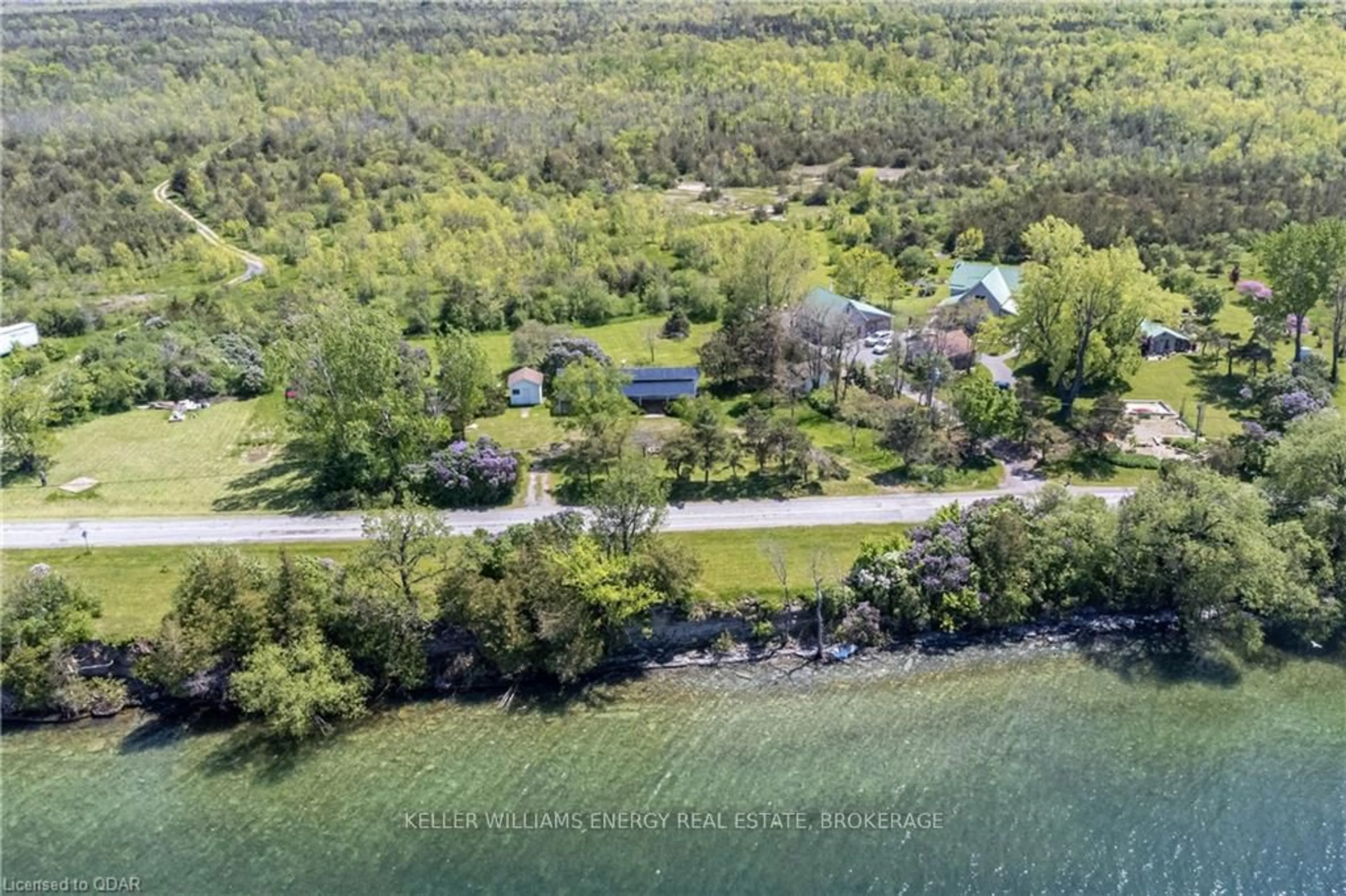 A pic from outside/outdoor area/front of a property/back of a property/a pic from drone, water/lake/river/ocean view for 5062 Long Point Rd, Prince Edward County Ontario K0K 2T0