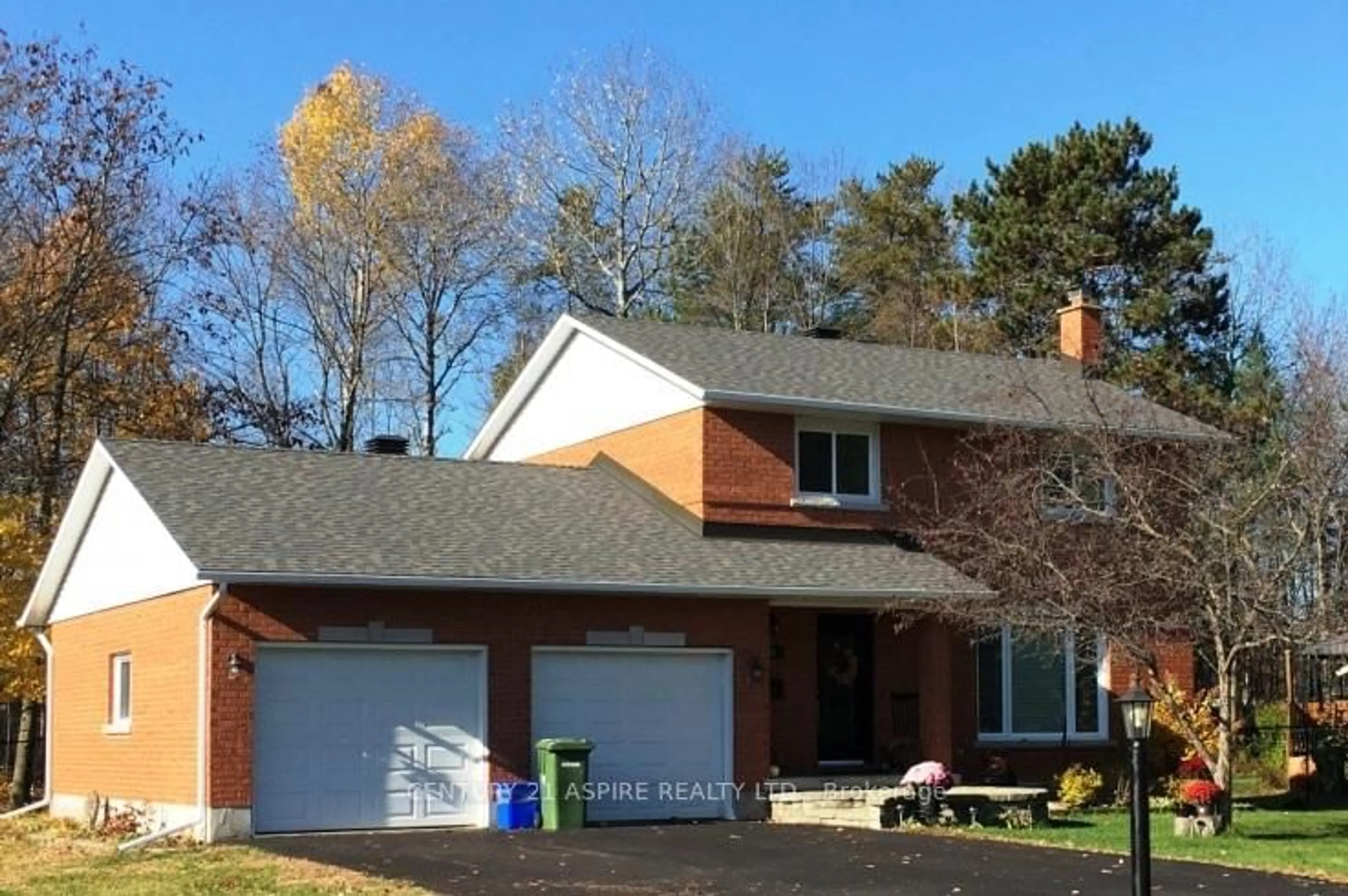 Home with brick exterior material, street for 36 Heritage Dr, Petawawa Ontario K8H 3J3