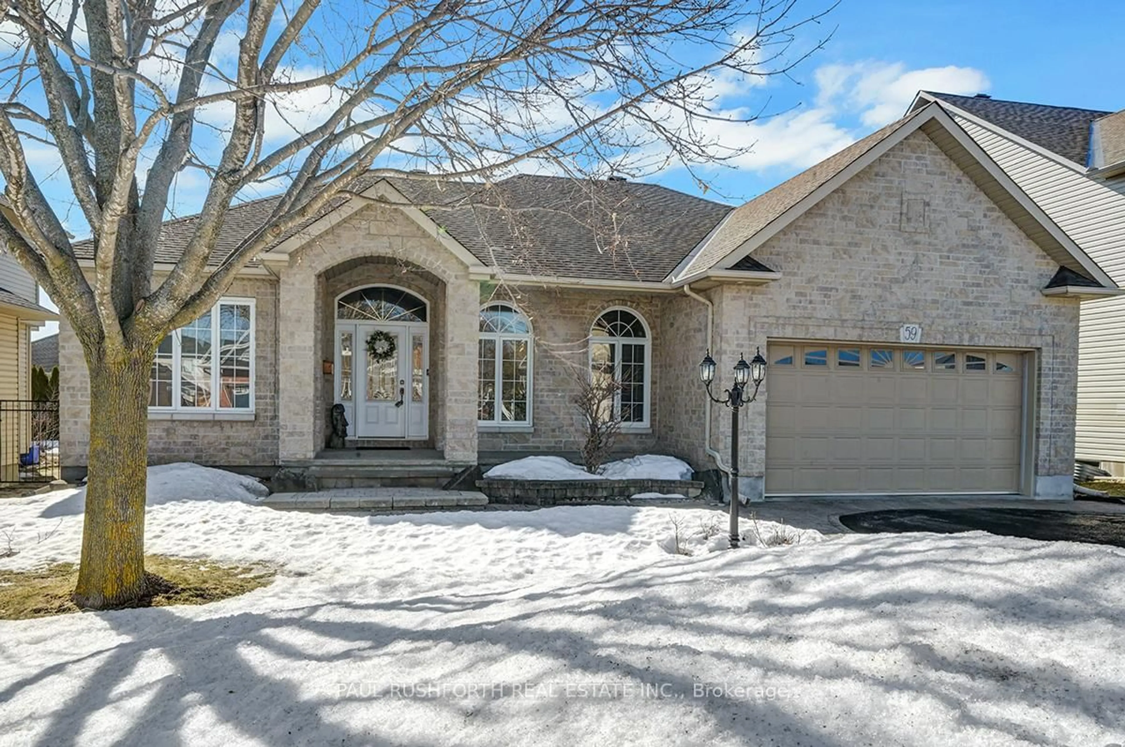 Home with brick exterior material, street for 59 Cinnabar Way, Ottawa Ontario K2S 1Y9