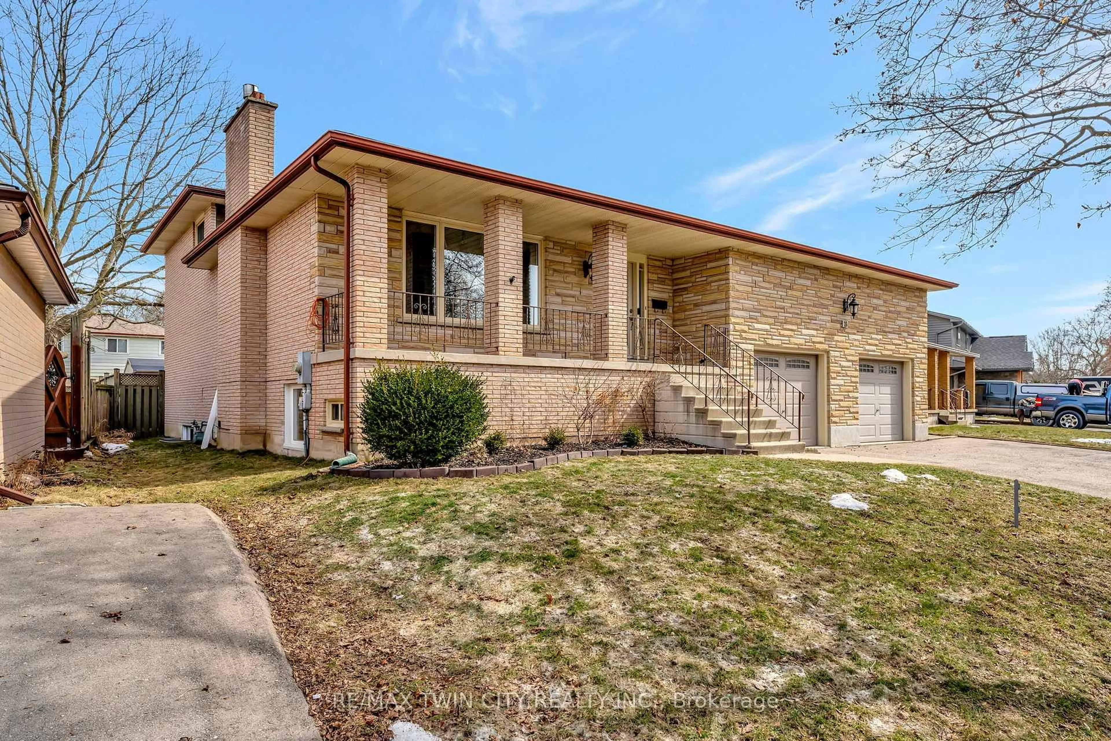 Home with brick exterior material, street for 18 Sprucehill Dr, Brantford Ontario N3R 3R6