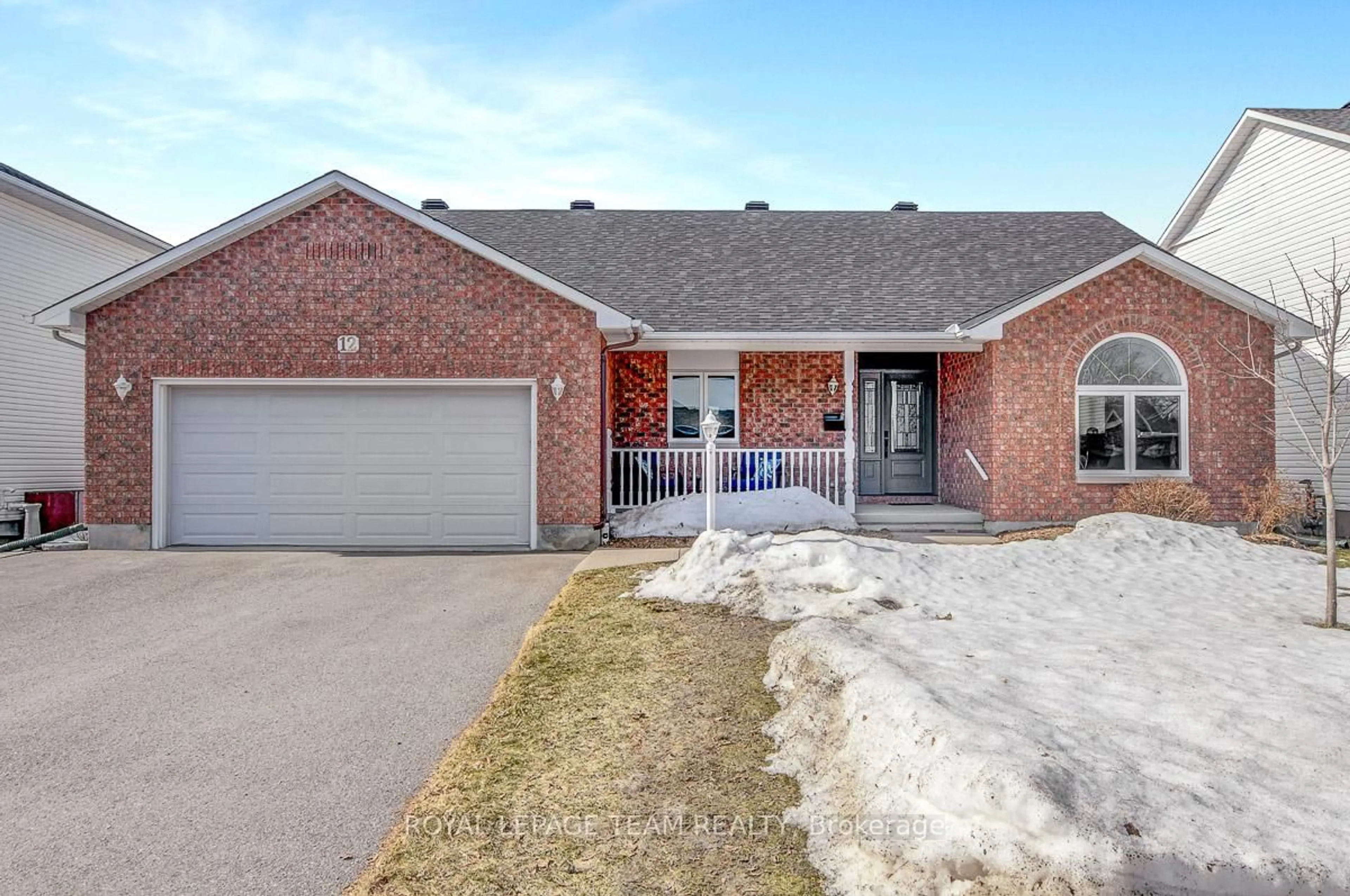 Home with brick exterior material, street for 12 Mika St, Stittsville Ontario K2S 1K8