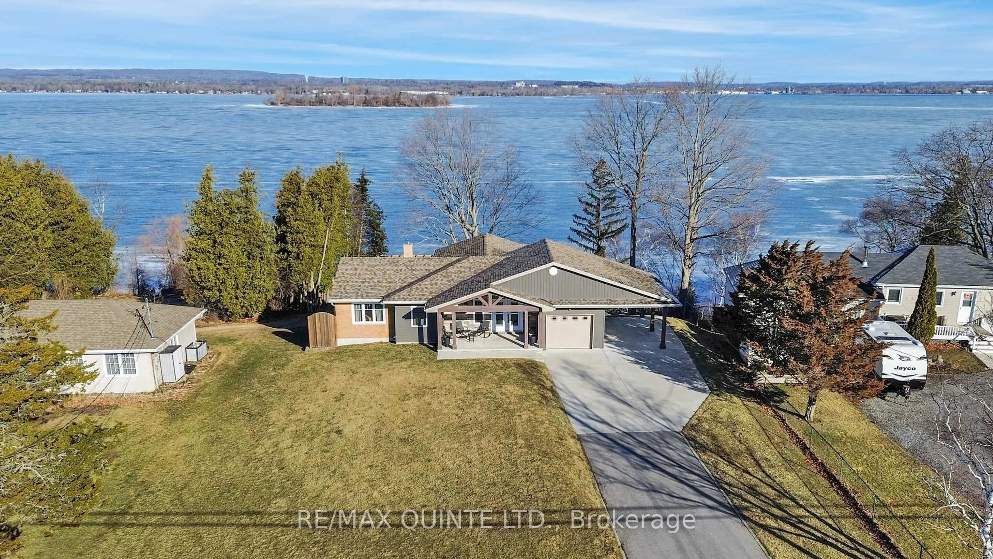 A pic from outside/outdoor area/front of a property/back of a property/a pic from drone, water/lake/river/ocean view for 3400 Rednersville Rd, Prince Edward County Ontario K0K 1L0