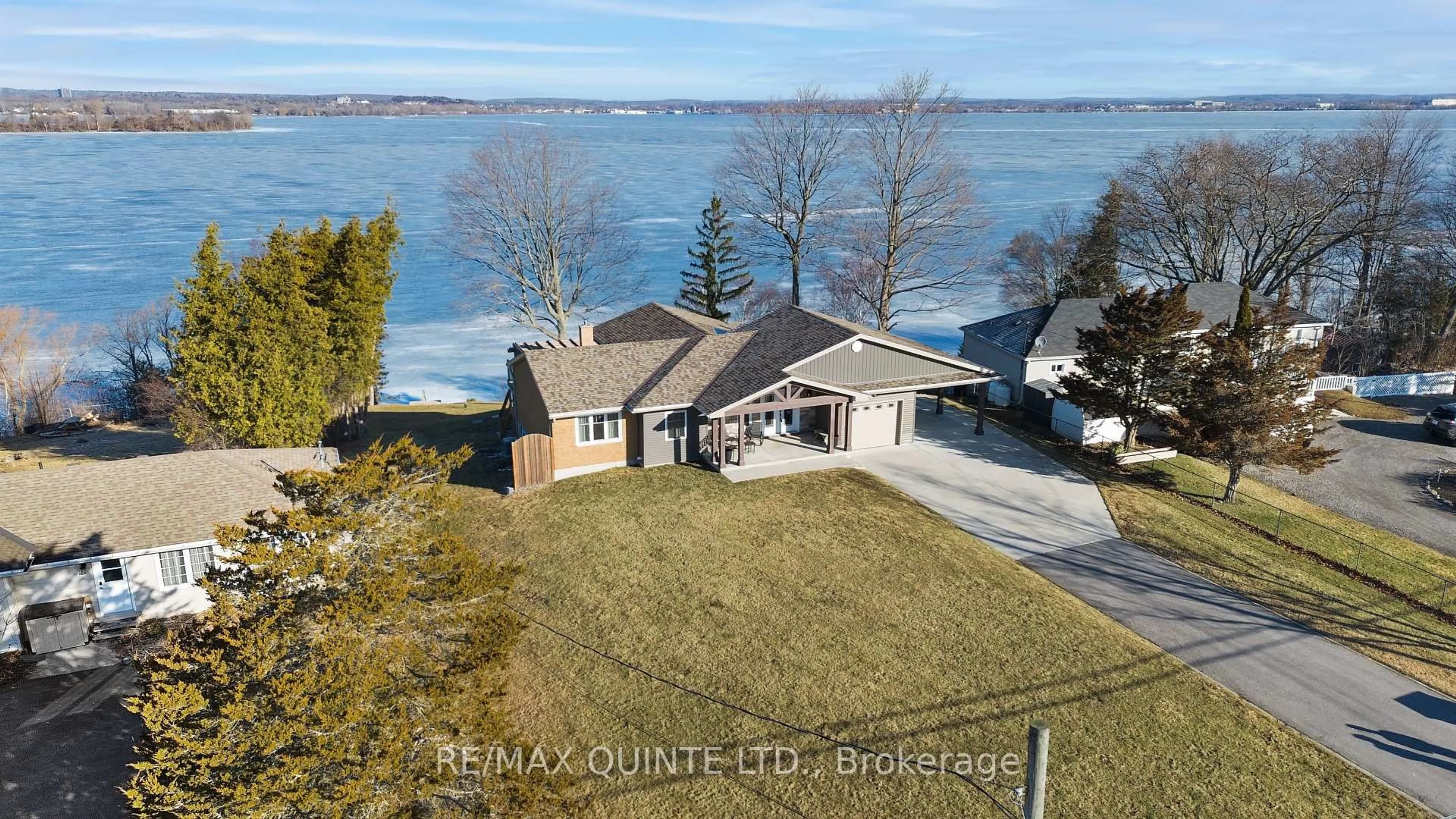 A pic from outside/outdoor area/front of a property/back of a property/a pic from drone, water/lake/river/ocean view for 3400 Rednersville Rd, Prince Edward County Ontario K0K 1L0