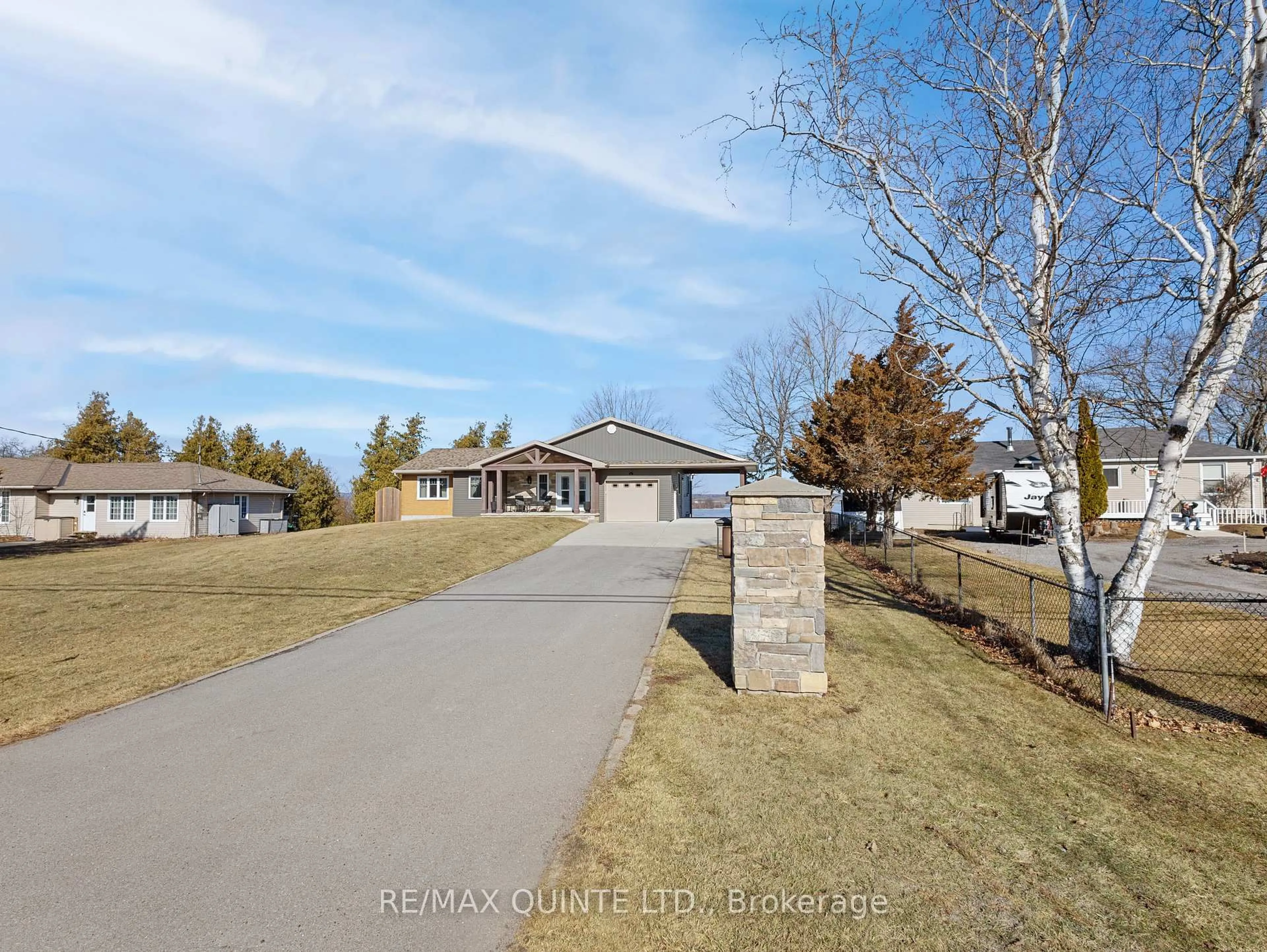 A pic from outside/outdoor area/front of a property/back of a property/a pic from drone, street for 3400 Rednersville Rd, Prince Edward County Ontario K0K 1L0