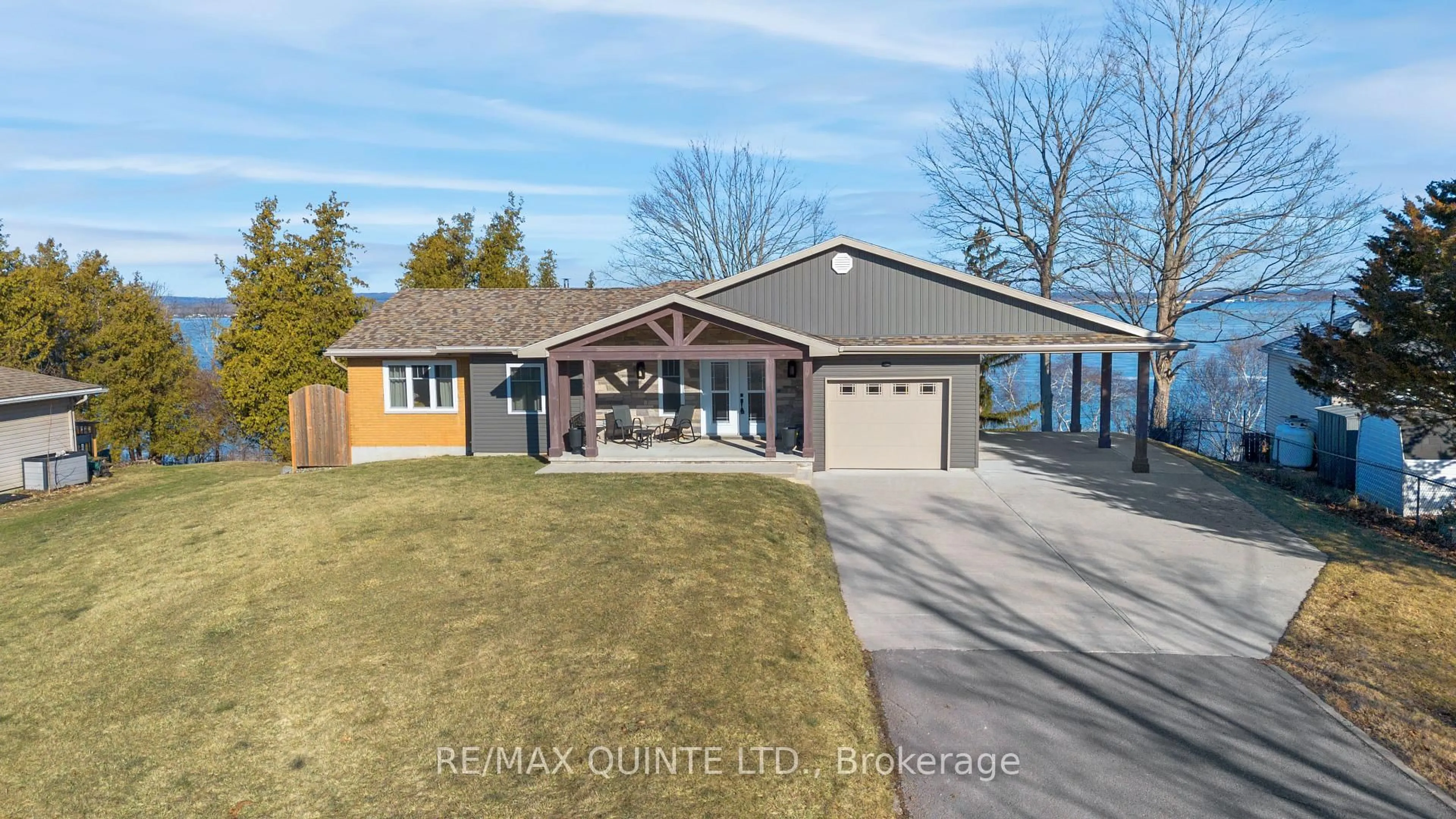 A pic from outside/outdoor area/front of a property/back of a property/a pic from drone, water/lake/river/ocean view for 3400 Rednersville Rd, Prince Edward County Ontario K0K 1L0