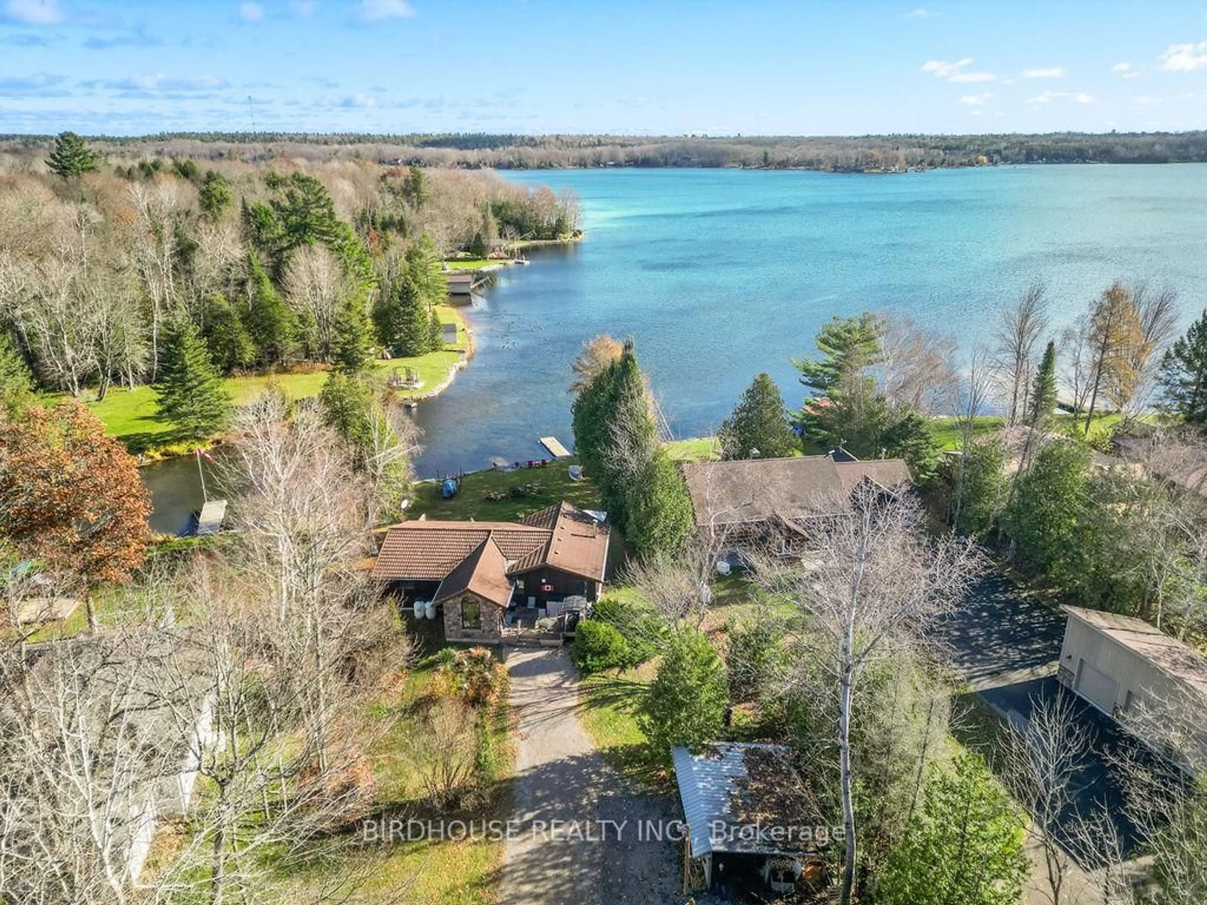 A pic from outside/outdoor area/front of a property/back of a property/a pic from drone, water/lake/river/ocean view for 217 Adam & Eve Rd, Galway-Cavendish and Harvey Ontario K0L 1J0