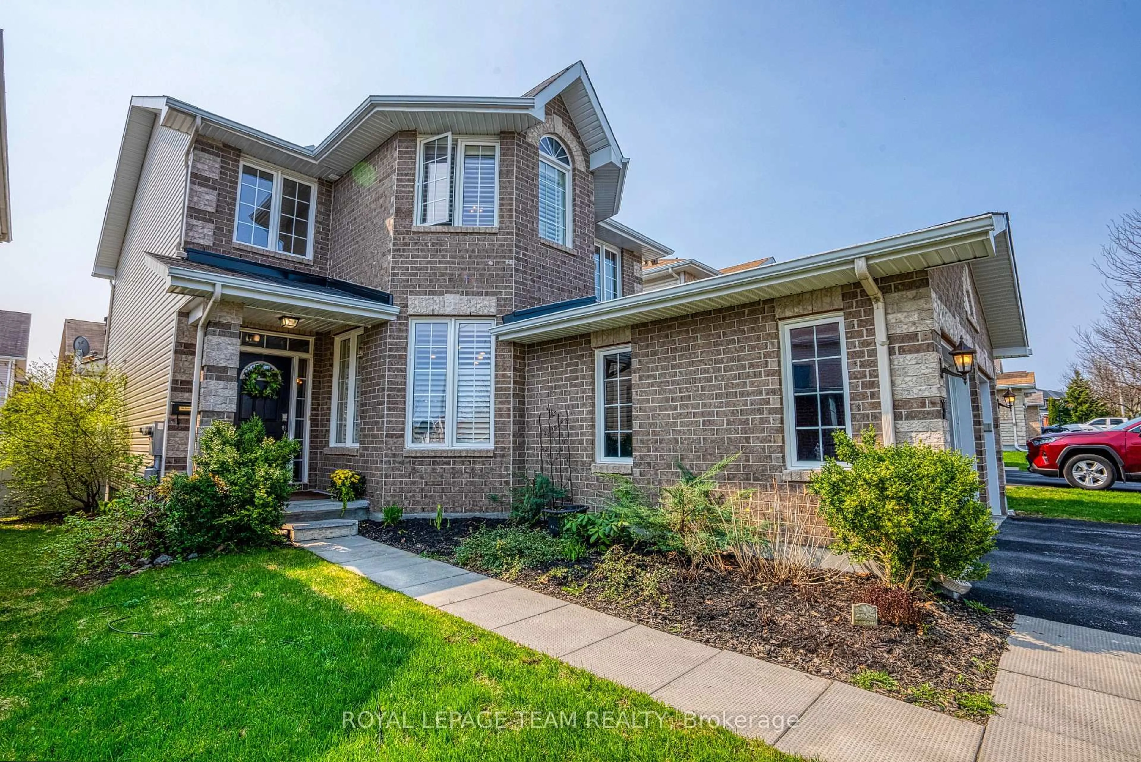 Home with brick exterior material, street for 35 Woliston Cres, Kanata Ontario K2W 1G3