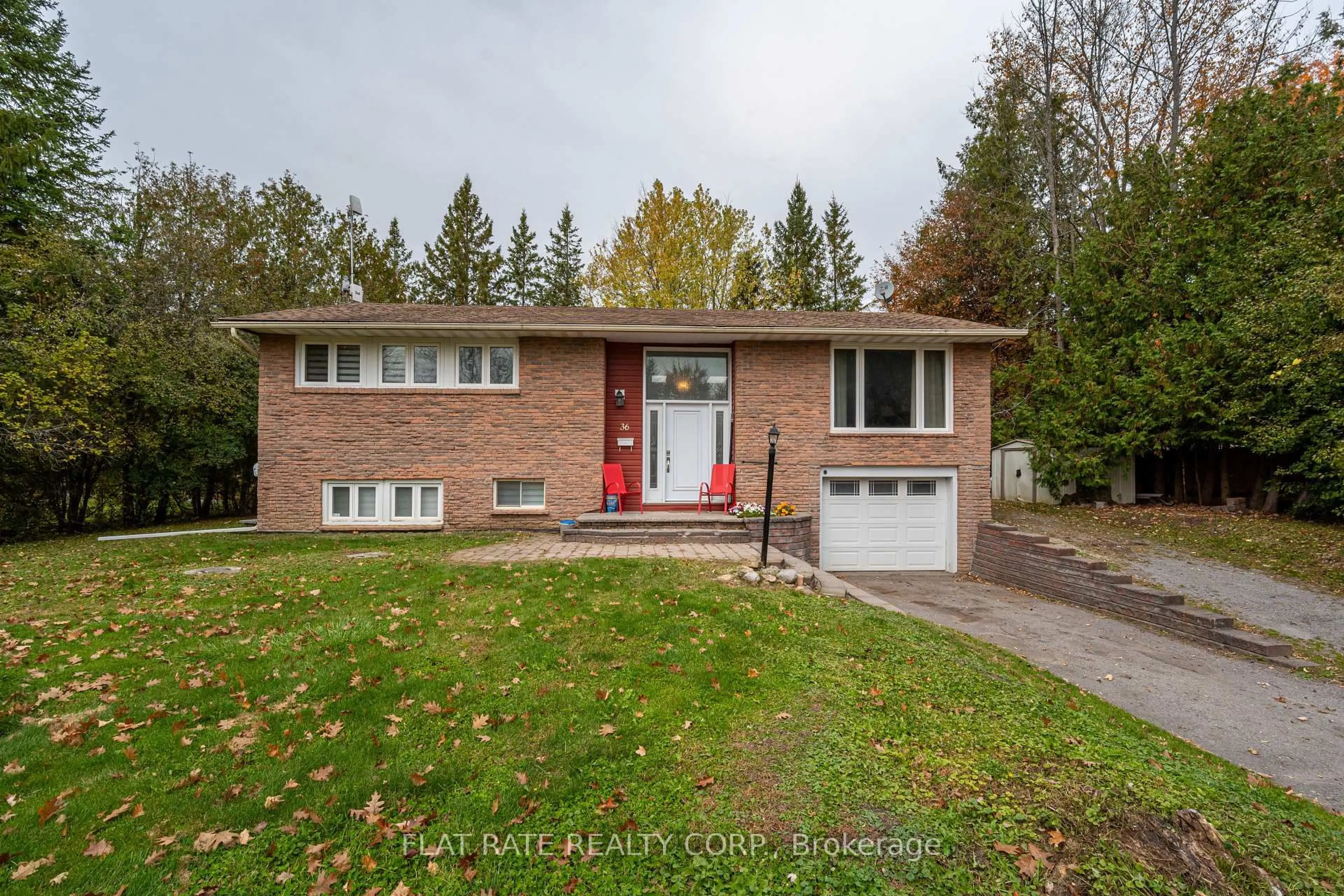 Home with brick exterior material, street for 36 EMILY MANOR Dr, Kawartha Lakes Ontario K0L 2W0