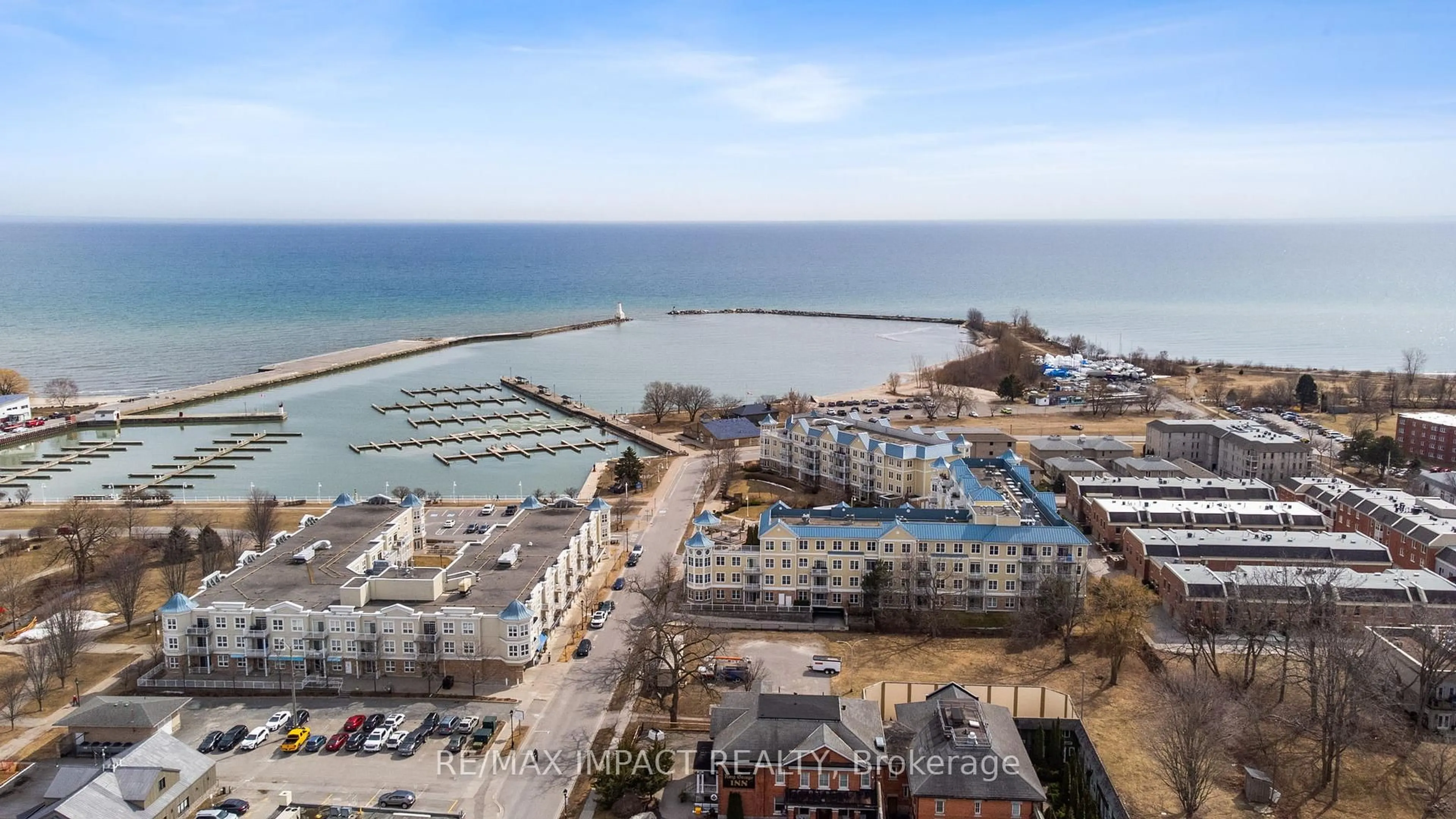 A pic from outside/outdoor area/front of a property/back of a property/a pic from drone, water/lake/river/ocean view for 145 Third St #319, Cobourg Ontario K9A 5X1