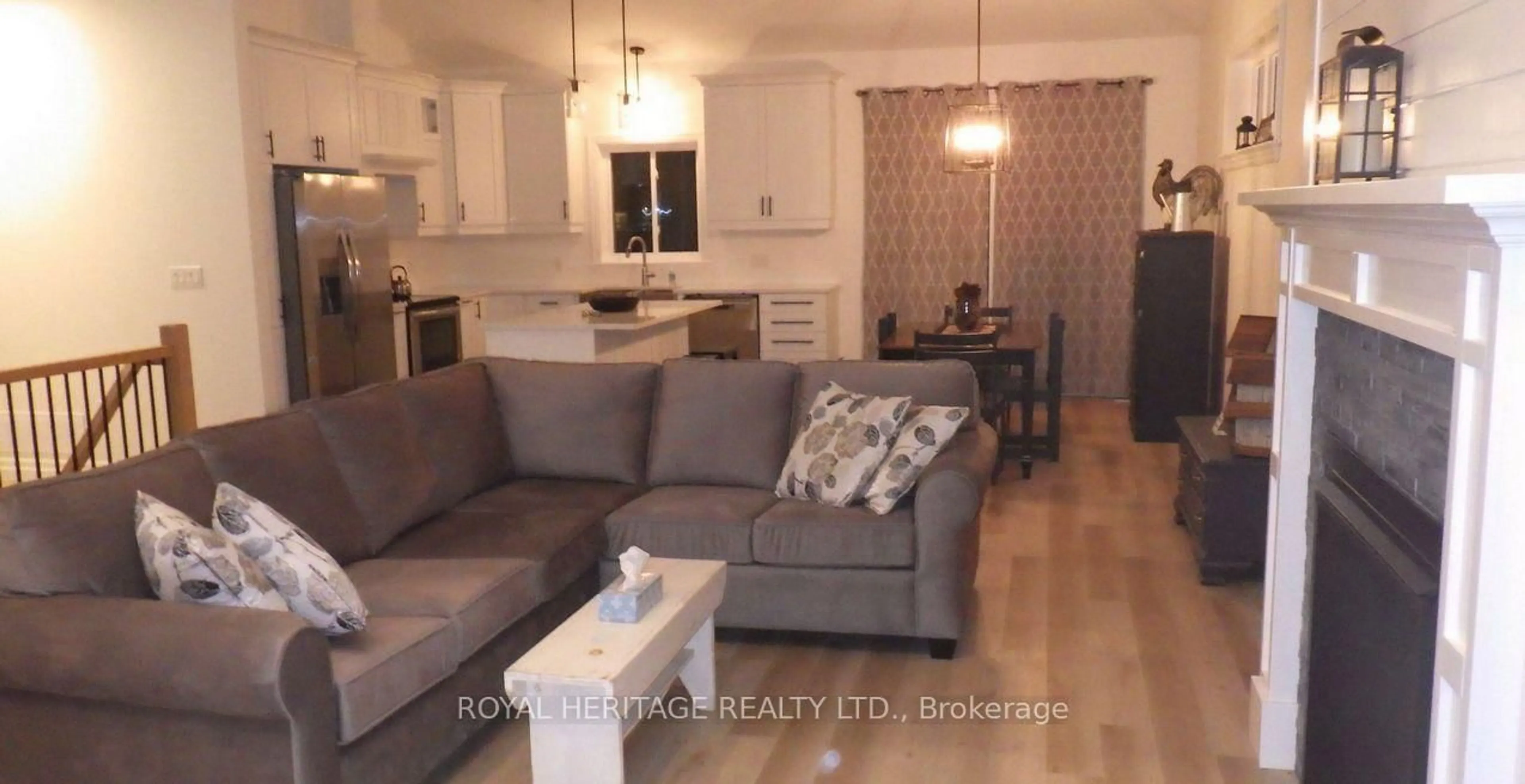 Living room with furniture, wood/laminate floor for 322 River St, Tweed Ontario K0K 3J0