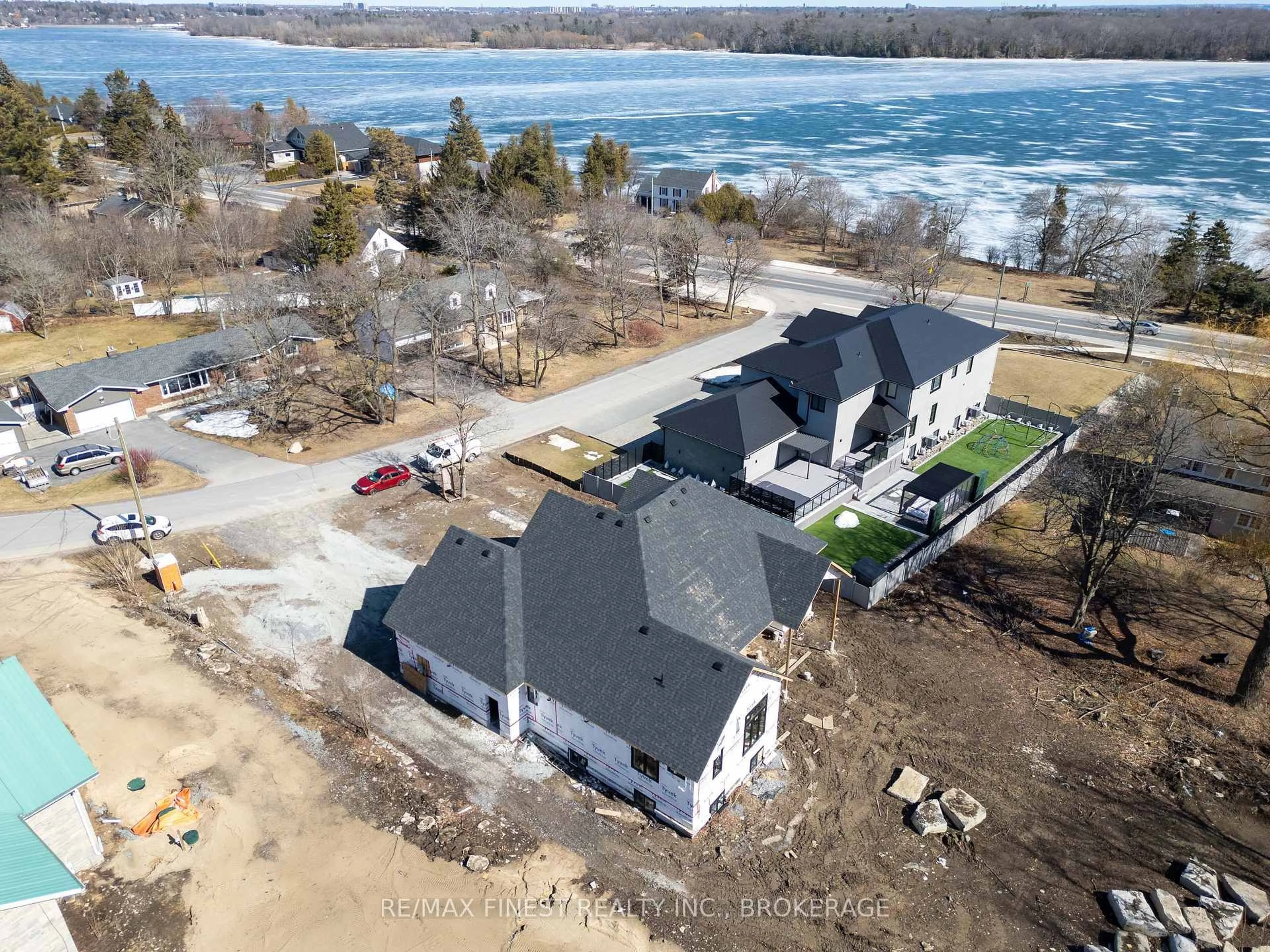 A pic from outside/outdoor area/front of a property/back of a property/a pic from drone, water/lake/river/ocean view for 371 MAPLE RIDGE Dr, Kingston Ontario K7M 5P1