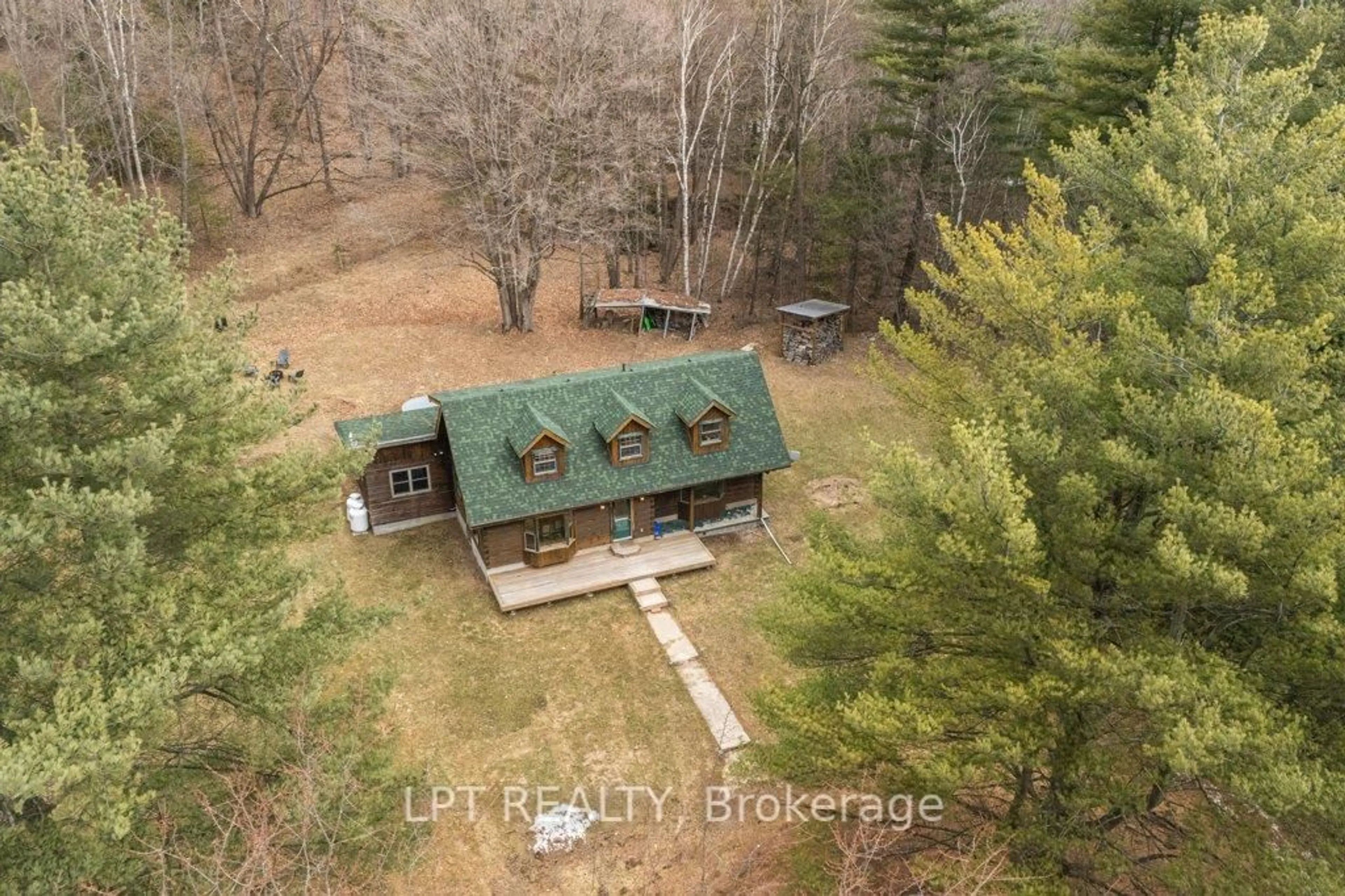 A pic from outside/outdoor area/front of a property/back of a property/a pic from drone, forest/trees view for 1043 Forty Foot Rd, Godfrey Ontario K0H 1T0