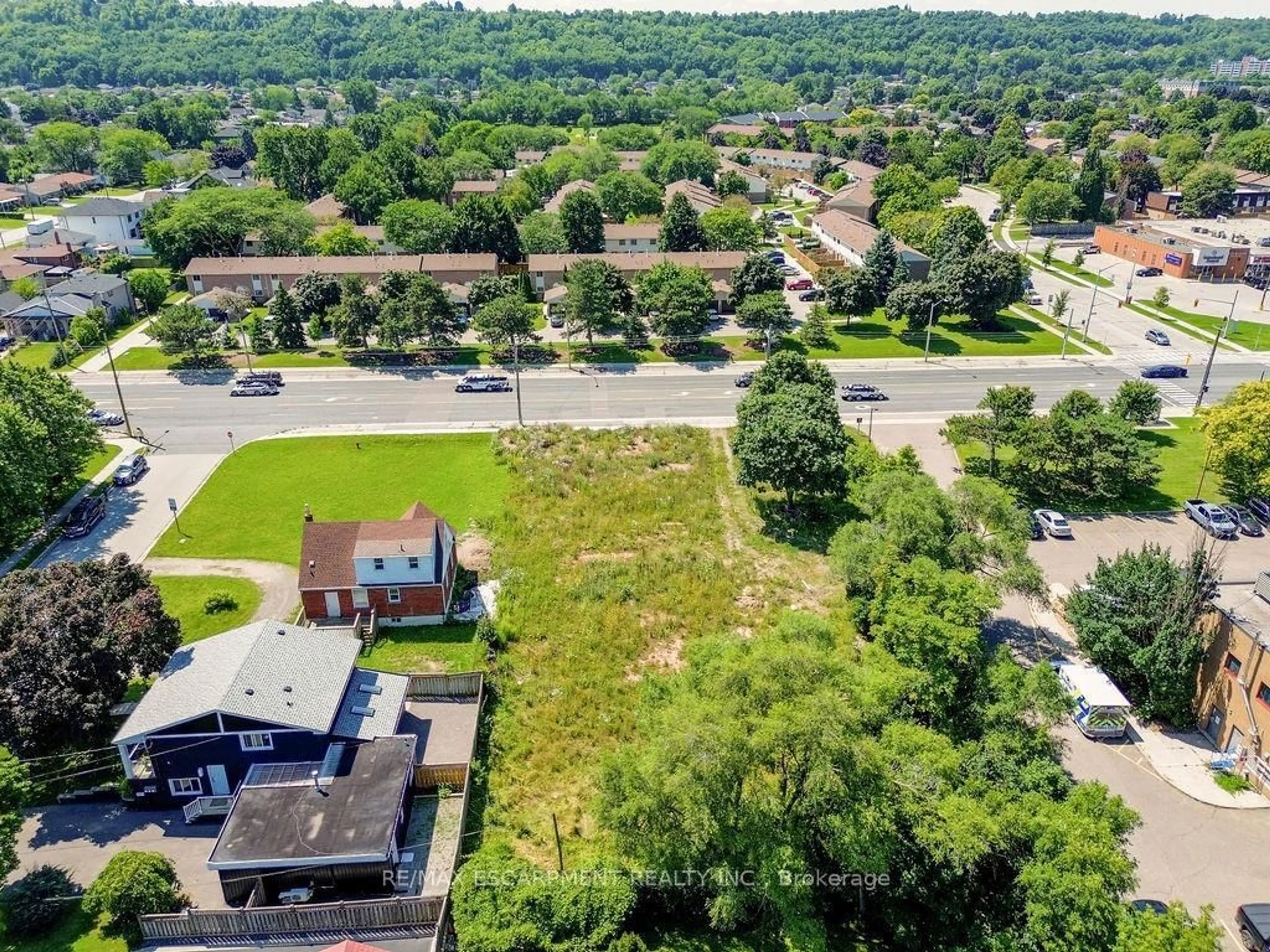 A pic from outside/outdoor area/front of a property/back of a property/a pic from drone, street for 205 Highway 8, Hamilton Ontario L8G 1C6