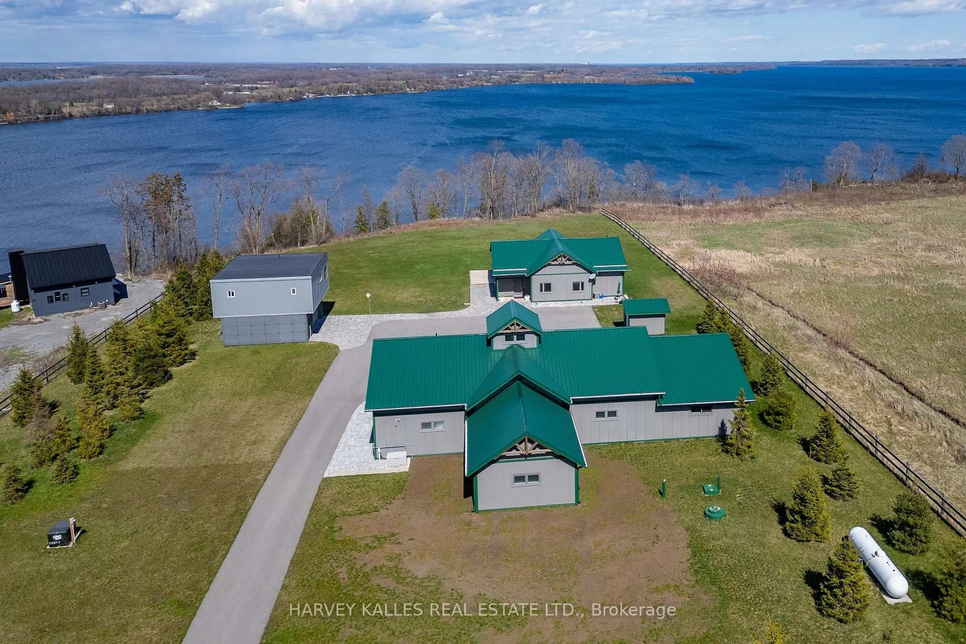 A pic from outside/outdoor area/front of a property/back of a property/a pic from drone, water/lake/river/ocean view for 359 County Road 7 N/A, Prince Edward County Ontario K0K 2T0