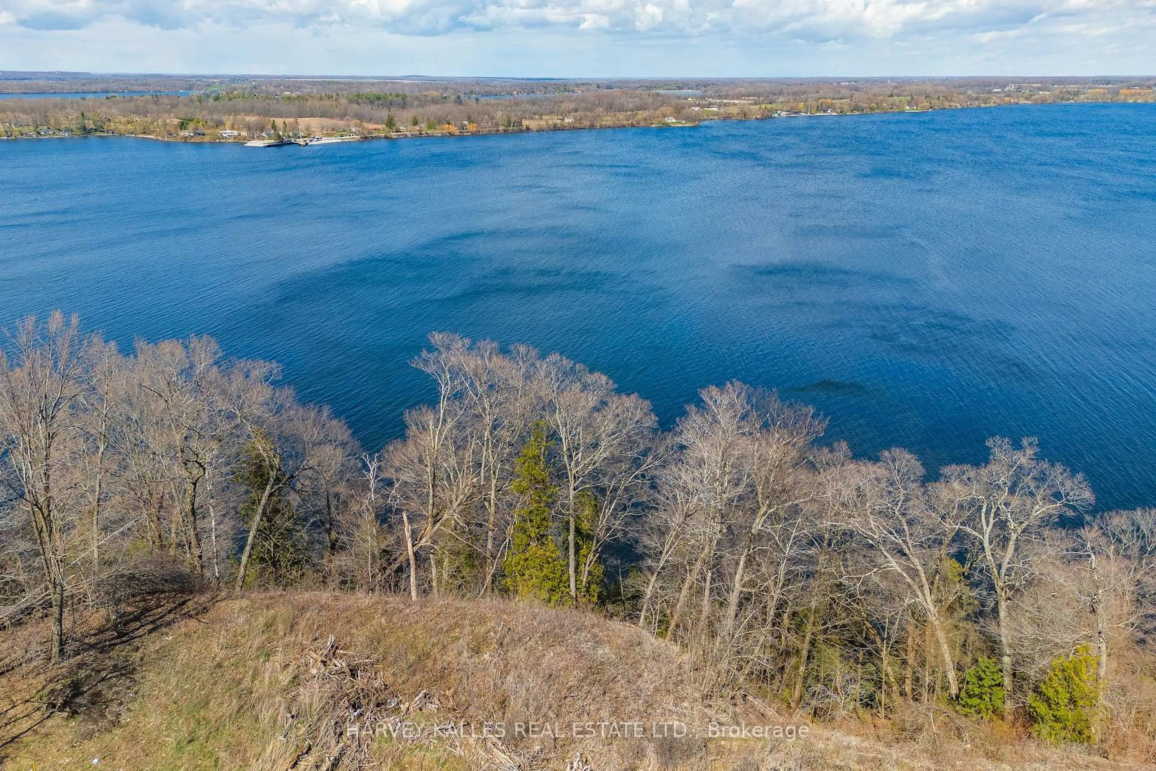 A pic from outside/outdoor area/front of a property/back of a property/a pic from drone, water/lake/river/ocean view for 359 County Road 7 N/A, Prince Edward County Ontario K0K 2T0