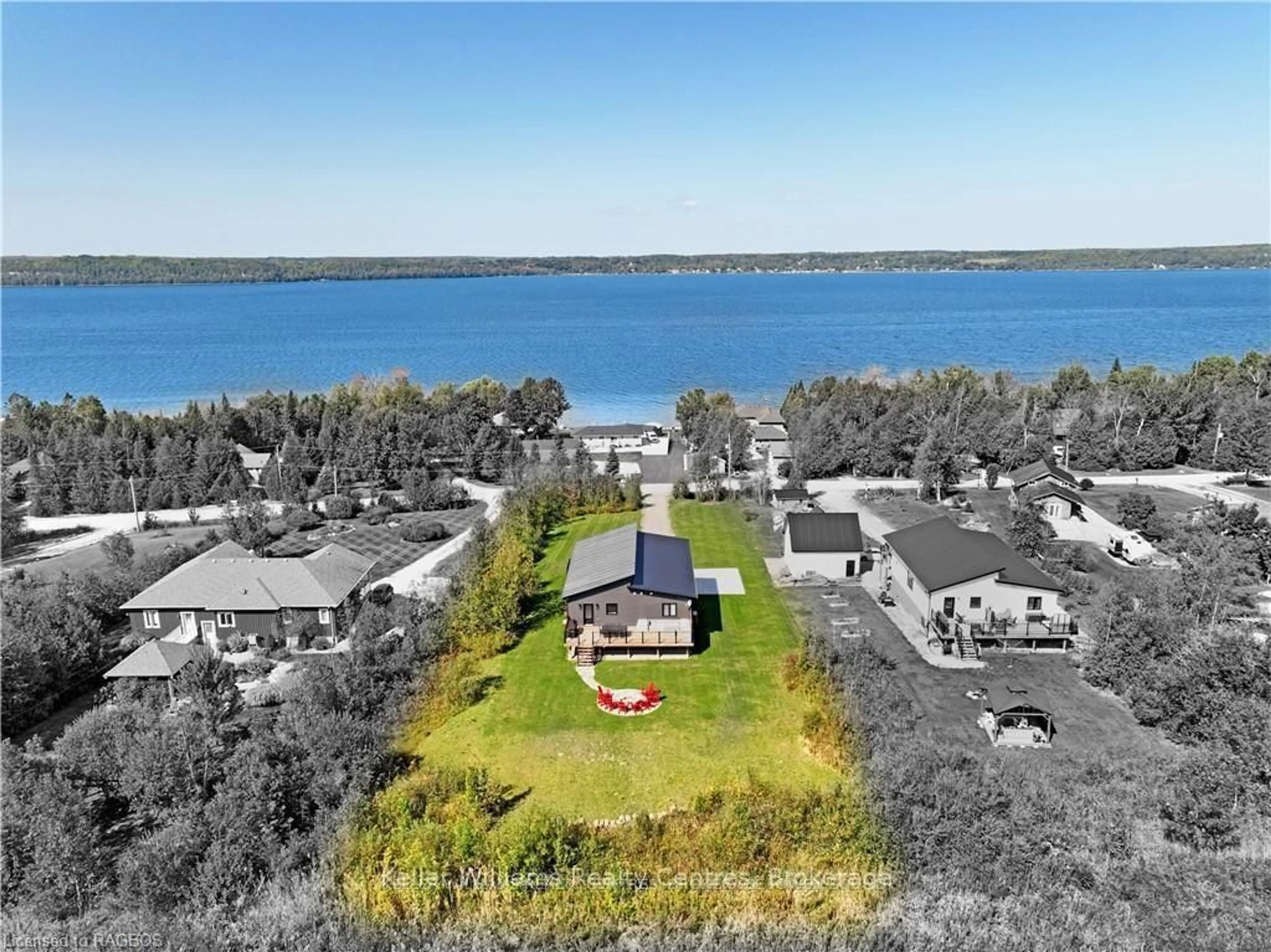 A pic from outside/outdoor area/front of a property/back of a property/a pic from drone, water/lake/river/ocean view for 138 SUNSET Blvd, Georgian Bluffs Ontario N0H 2T0