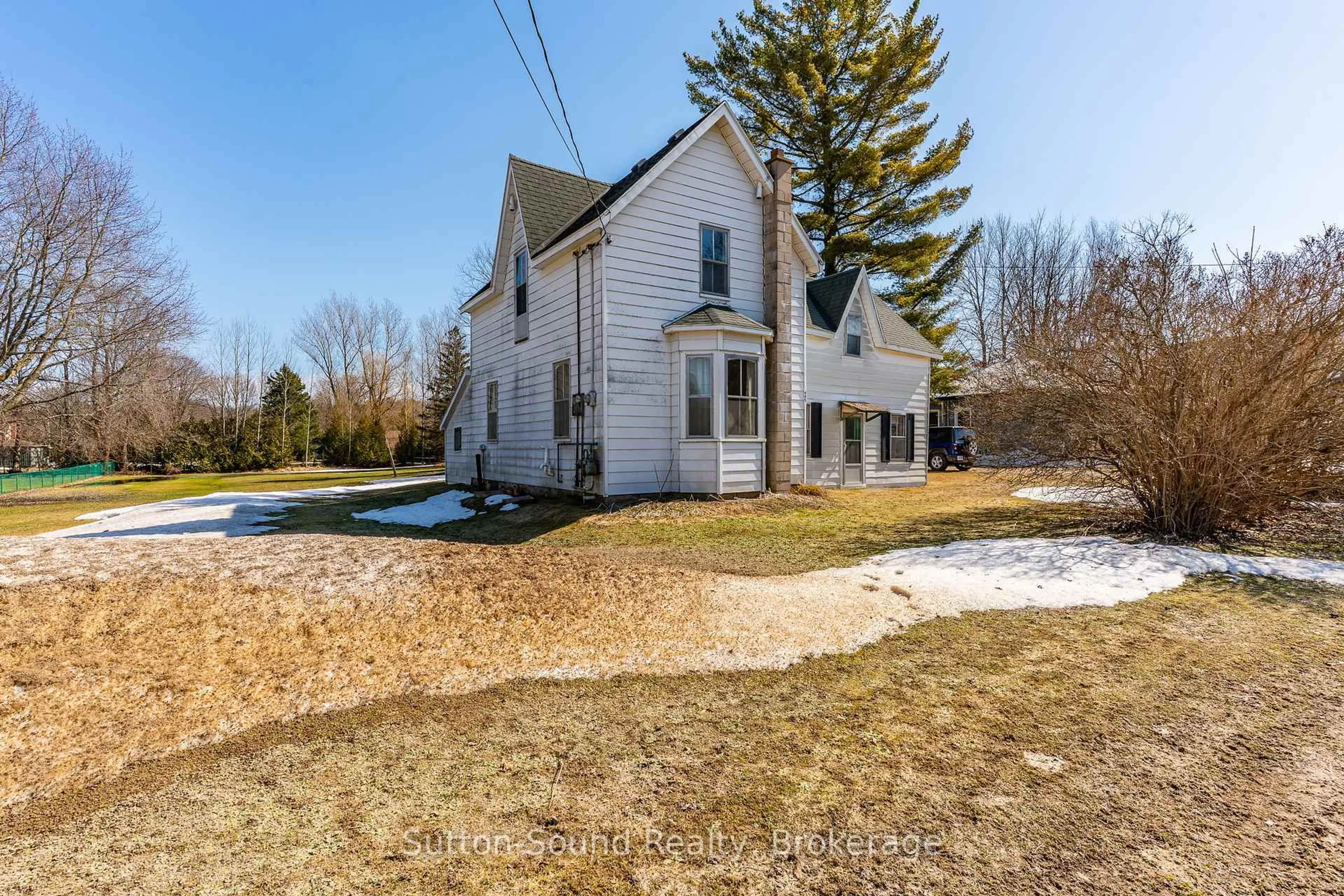 A pic from outside/outdoor area/front of a property/back of a property/a pic from drone, street for 443 and 445 Taylor St, South Bruce Peninsula Ontario N0H 2T0