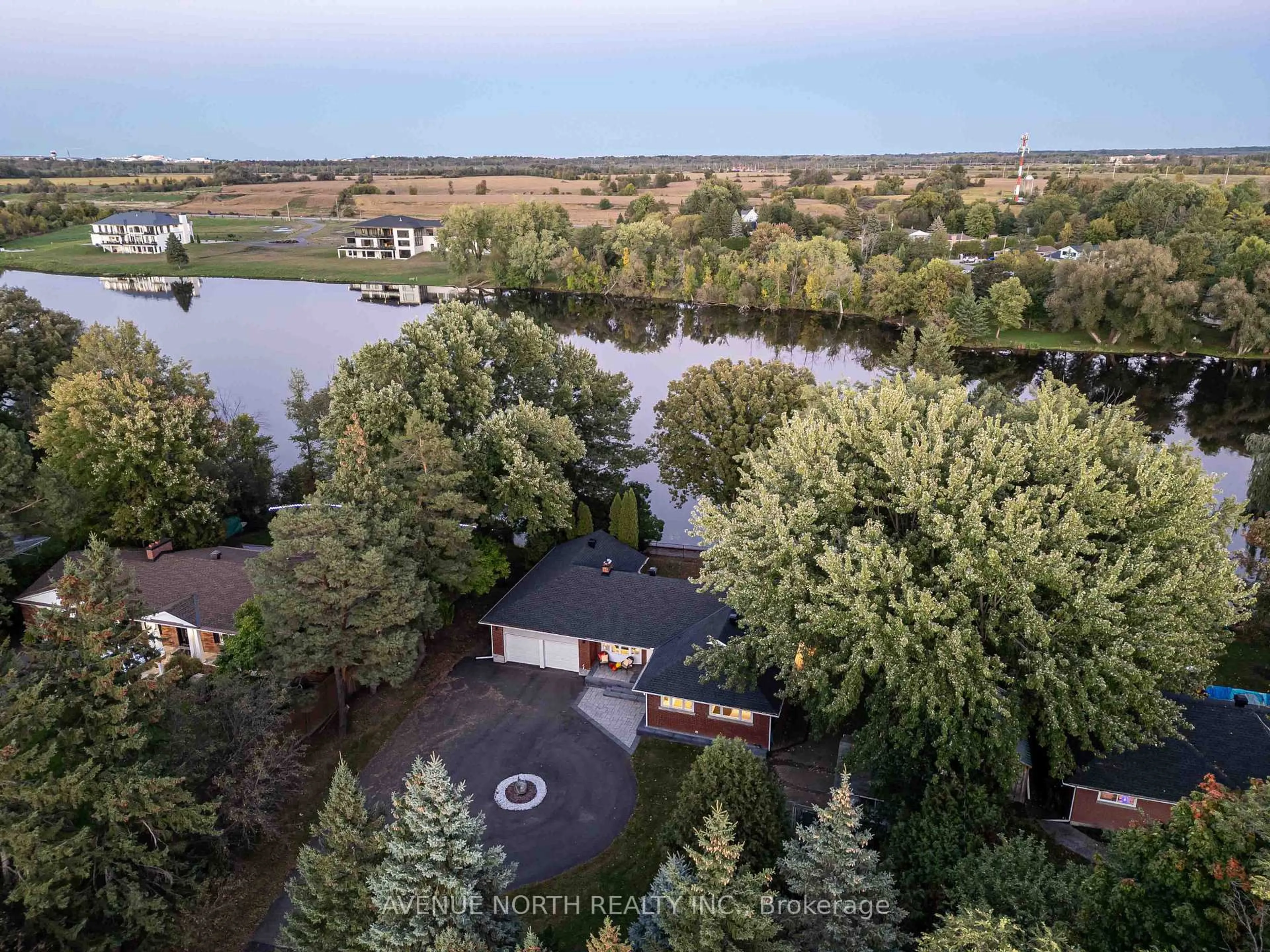 A pic from outside/outdoor area/front of a property/back of a property/a pic from drone, water/lake/river/ocean view for 3027 Prince Of Wales Dr, Ottawa Ontario K2C 3H1