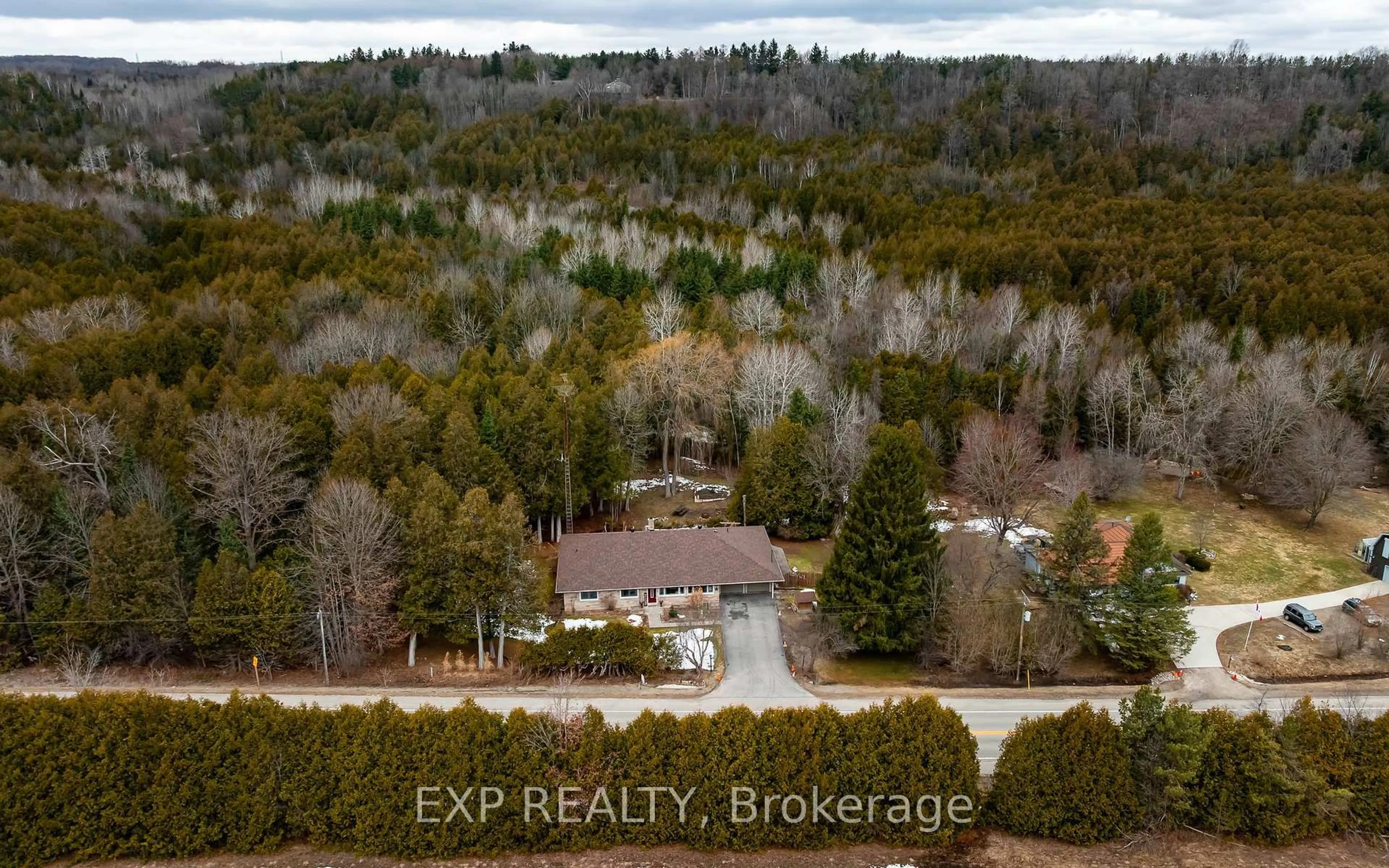 A pic from outside/outdoor area/front of a property/back of a property/a pic from drone, forest/trees view for 307073 Hockley Rd, Mono Ontario L9W 6M8