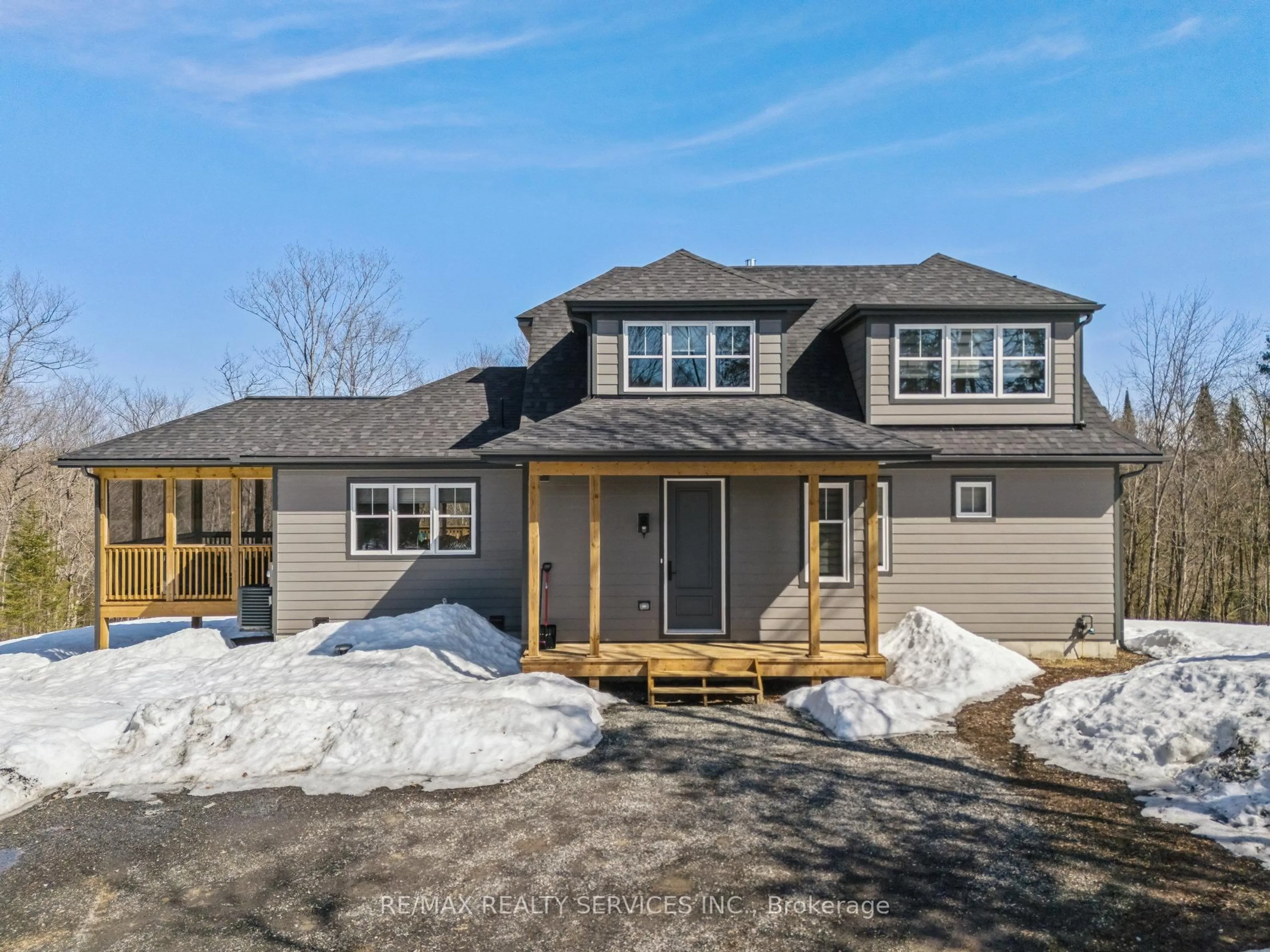 Home with vinyl exterior material, street for 1020 Ridgeline Dr, Lake of Bays Ontario P1H 0K1