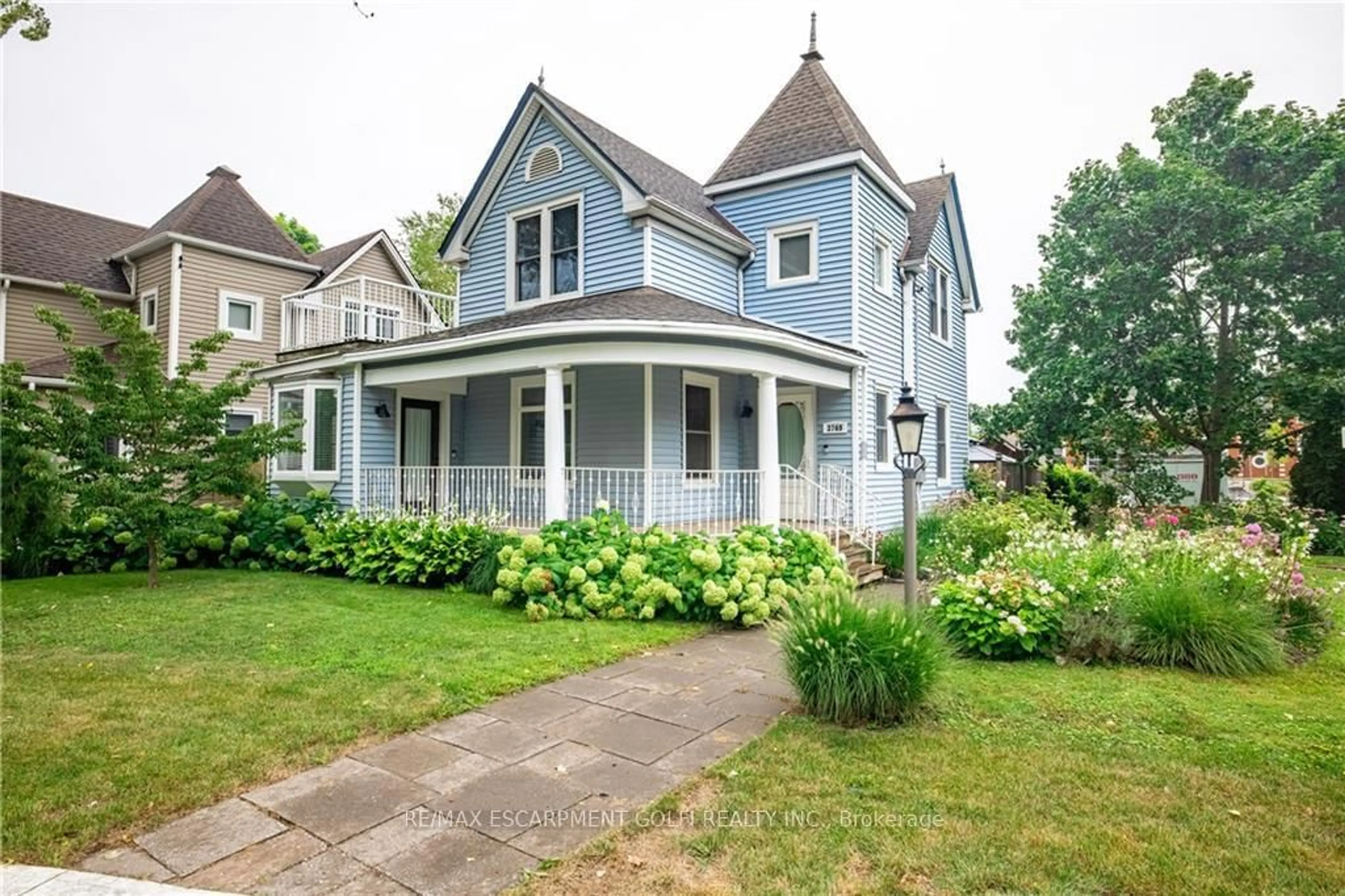 Home with vinyl exterior material, street for 3769 Main St, Lincoln Ontario L0R 1S0