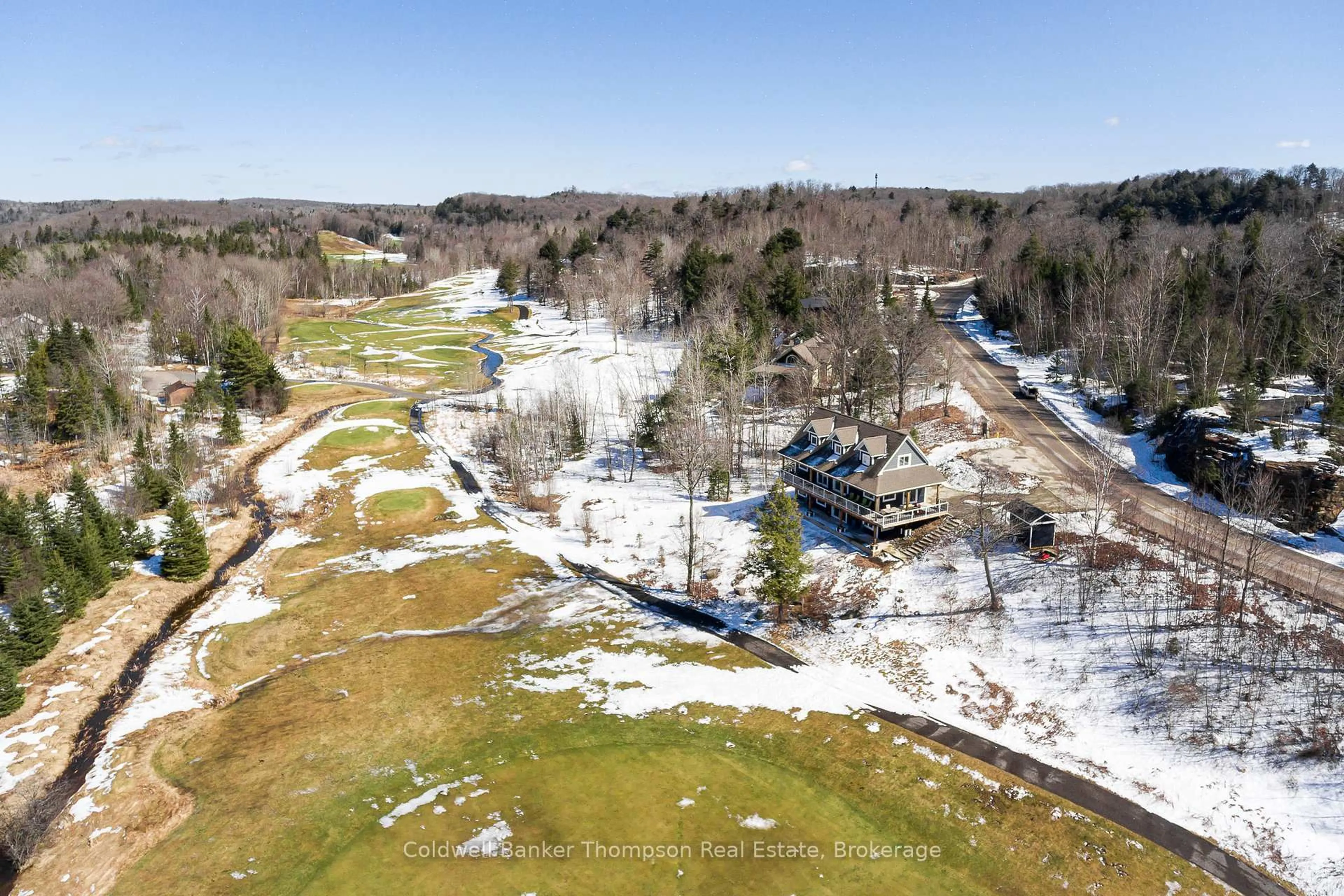 A pic from outside/outdoor area/front of a property/back of a property/a pic from drone, water/lake/river/ocean view for 17 Deerhurst Highlands Dr, Huntsville Ontario P1H 1B1