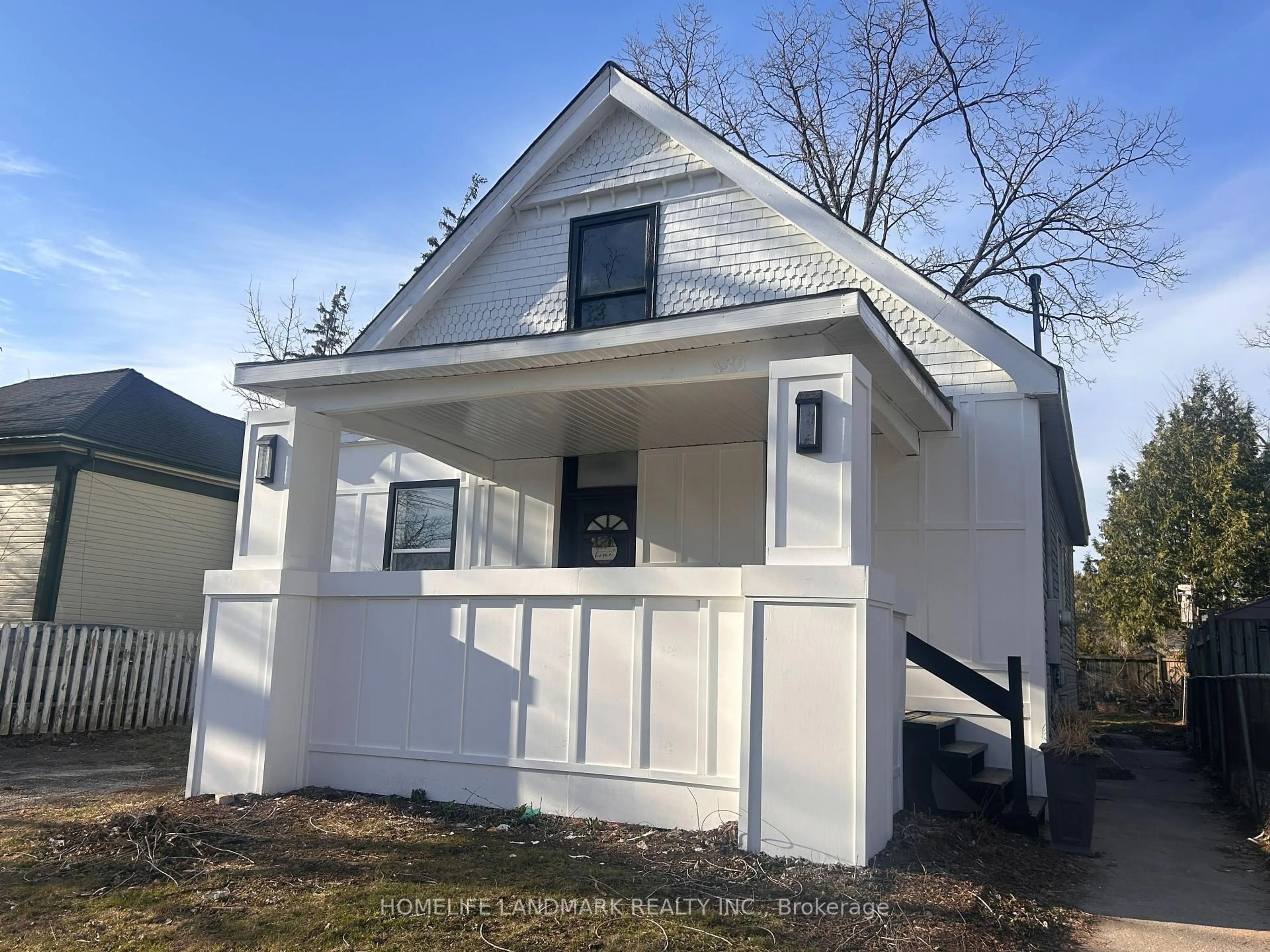 Home with vinyl exterior material, street for 130 Langarth St, London South Ontario N6C 1Z5